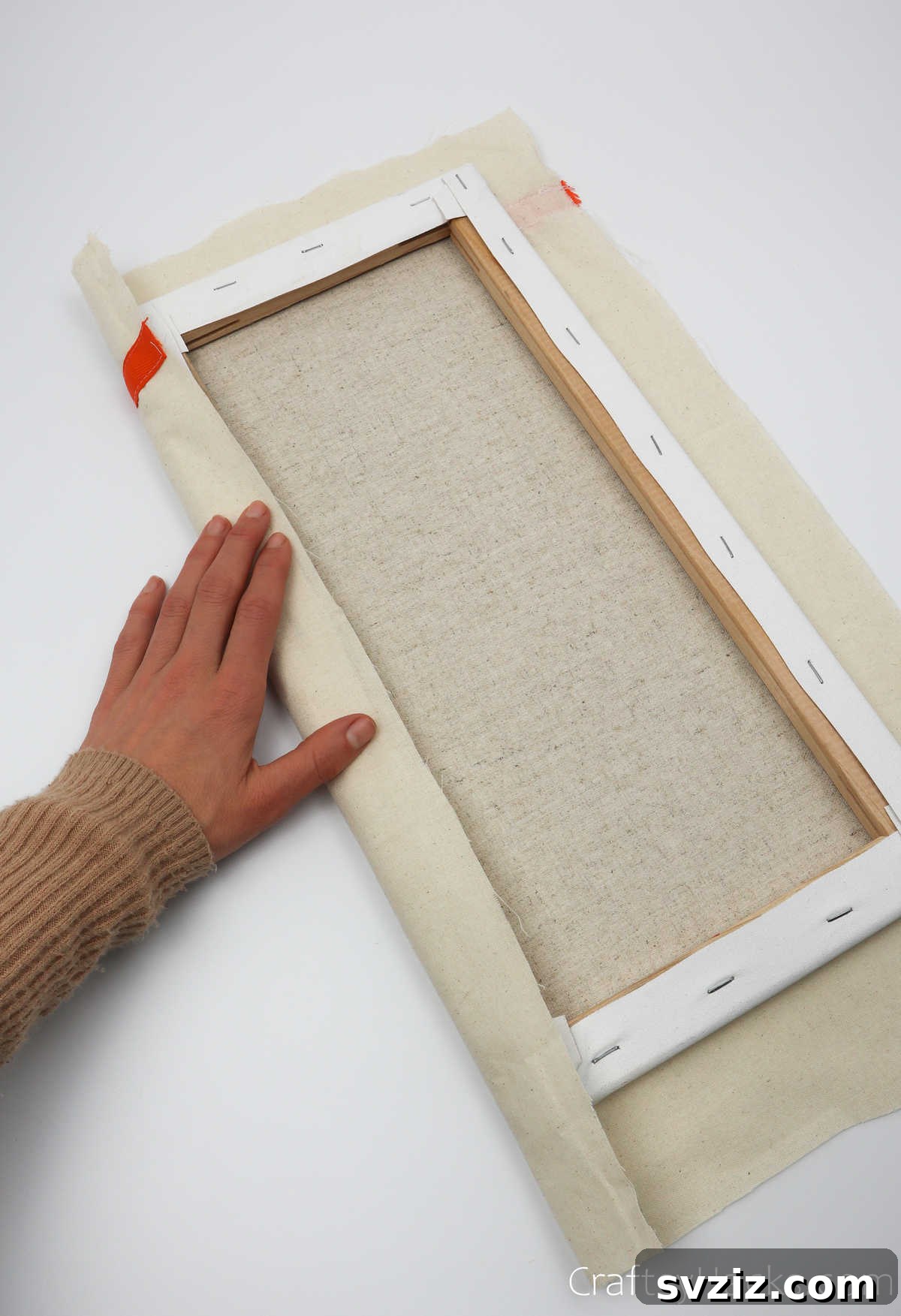 Design Your Own Mail Sorting Solution 23 Folding and gluing fabric over the canvas edge