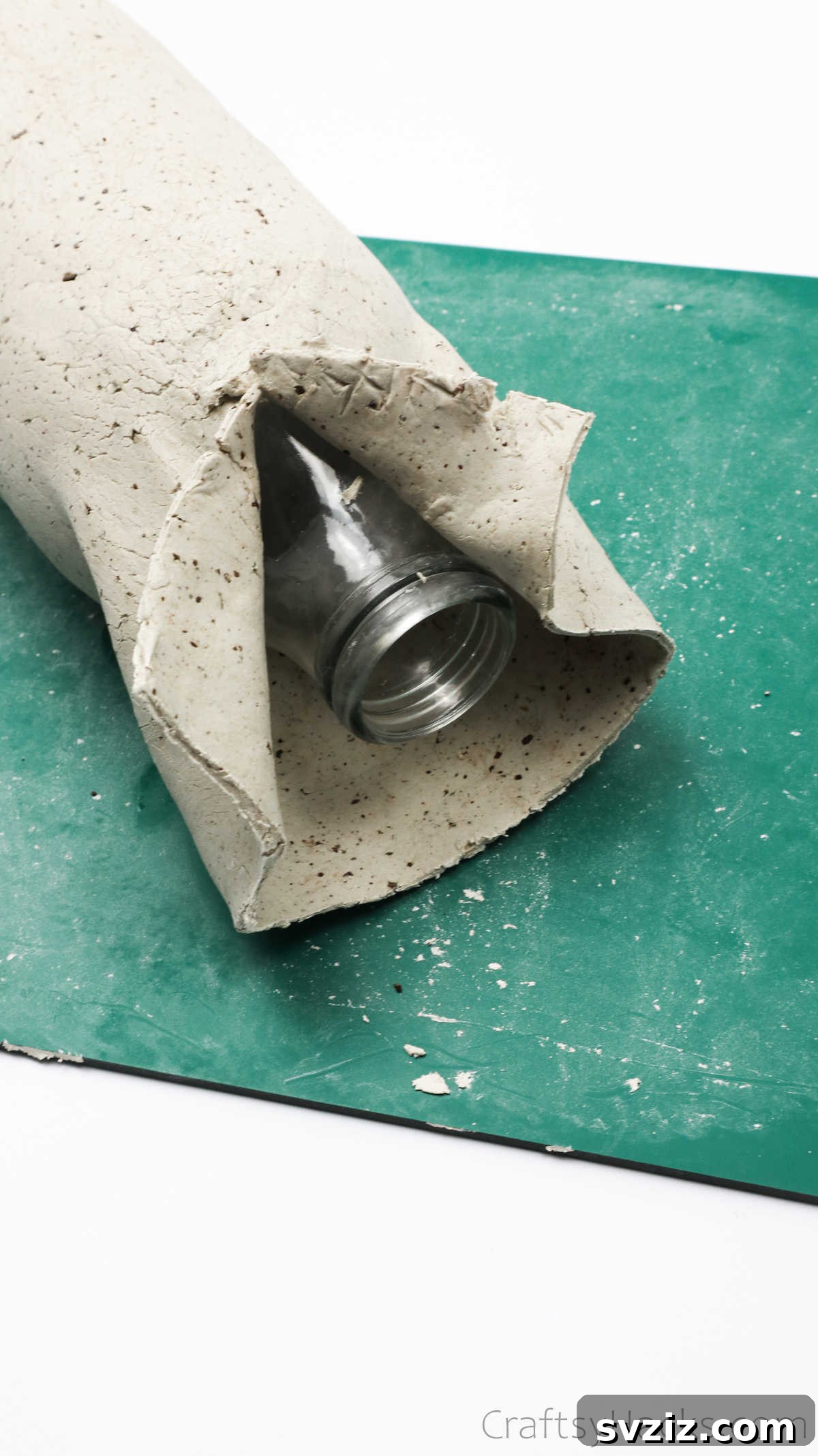 Uncovered Top of the Clay-Wrapped Bottle