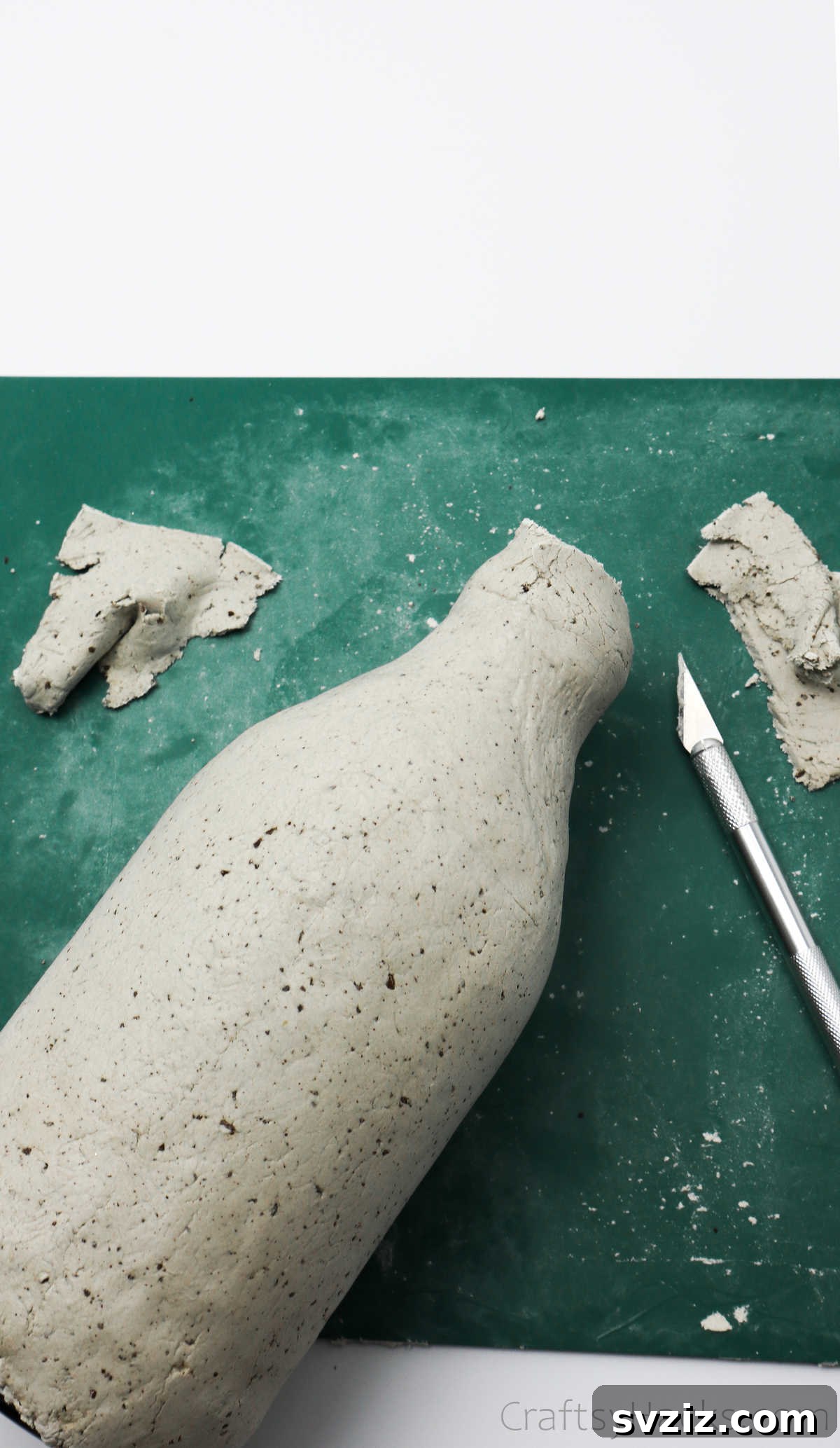 Trimming Excess Clay from Bottle Rim