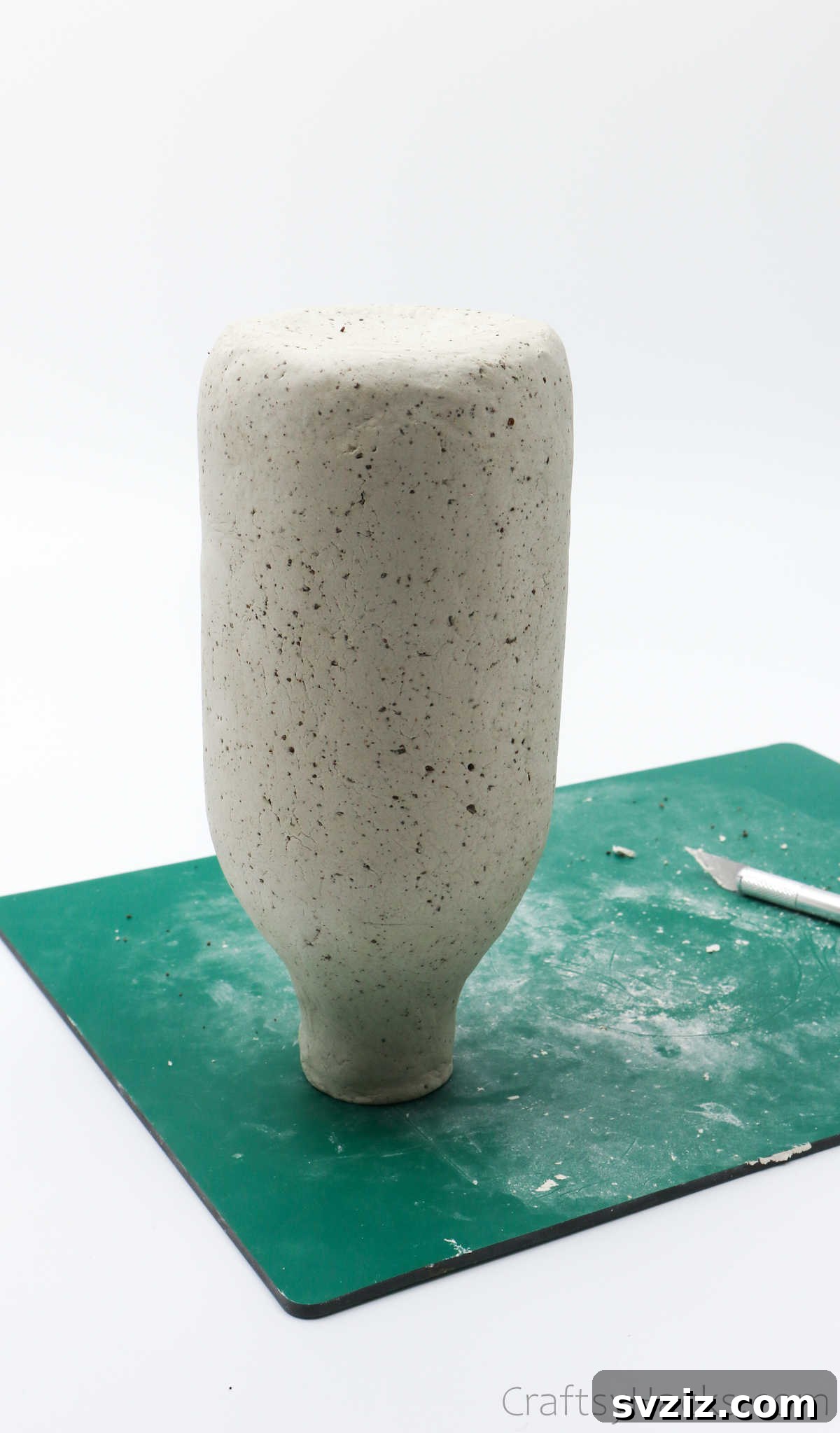 Clay Bottle Vase Drying Upside Down