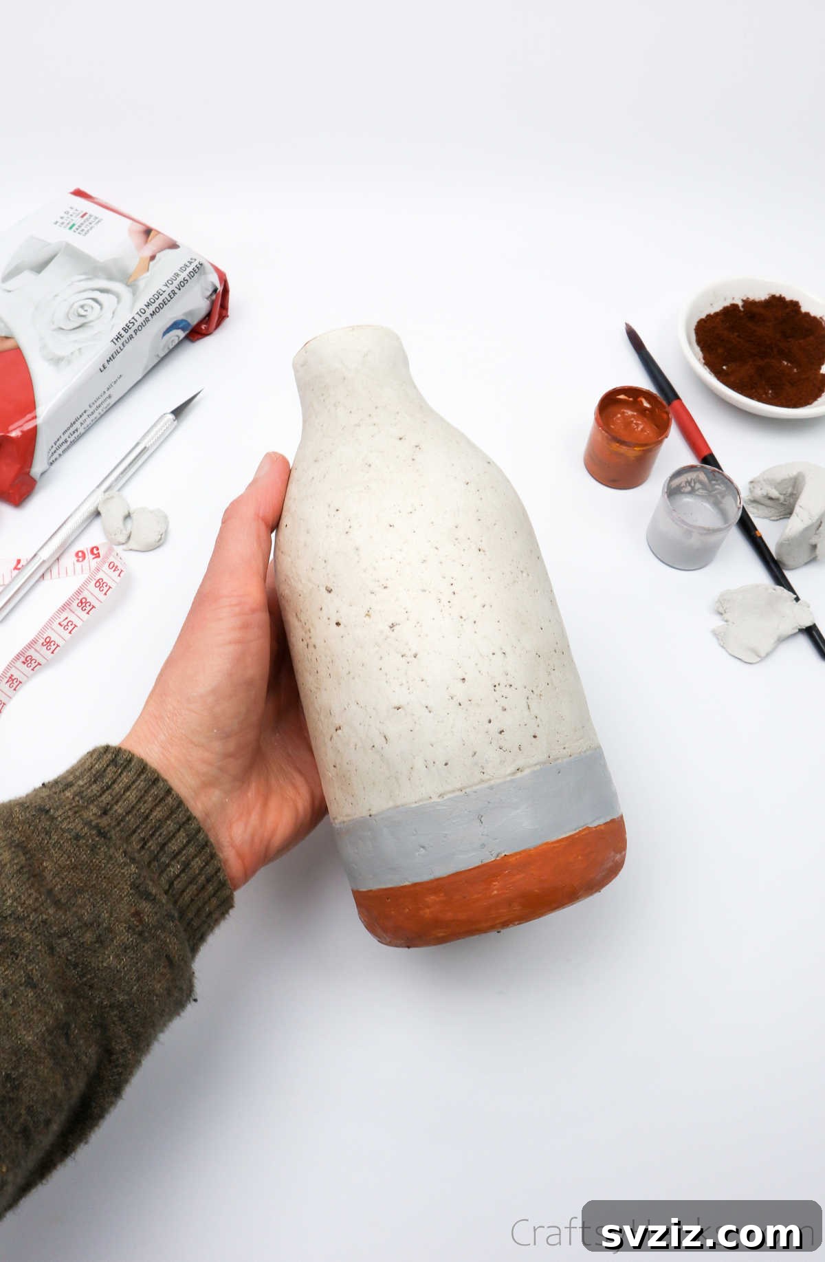 Holding the Finished DIY Bottle Vase