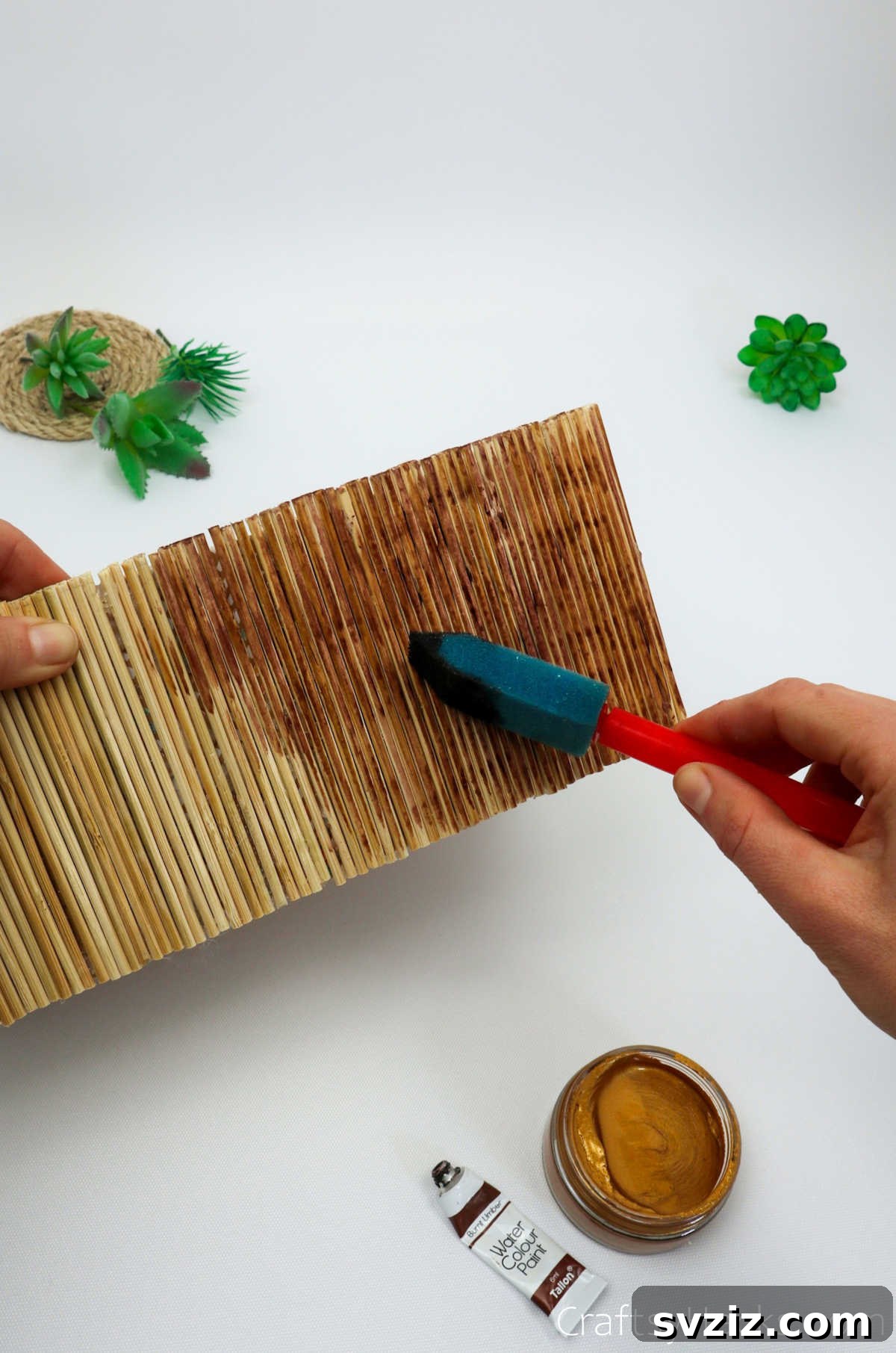 Boho Succulent Bliss: Your DIY Planter Guide 18 adding paint to skewers