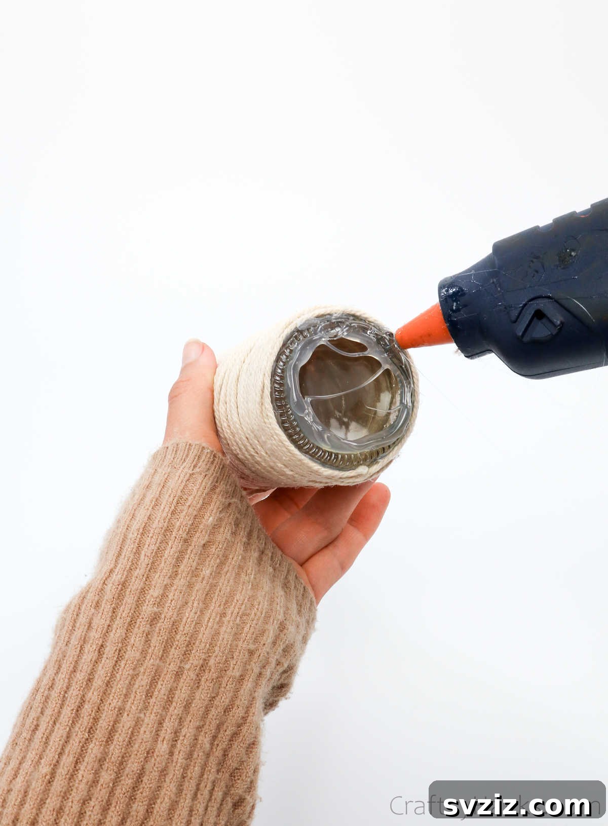 Securing the First Bottle to the Wood Base with Glue