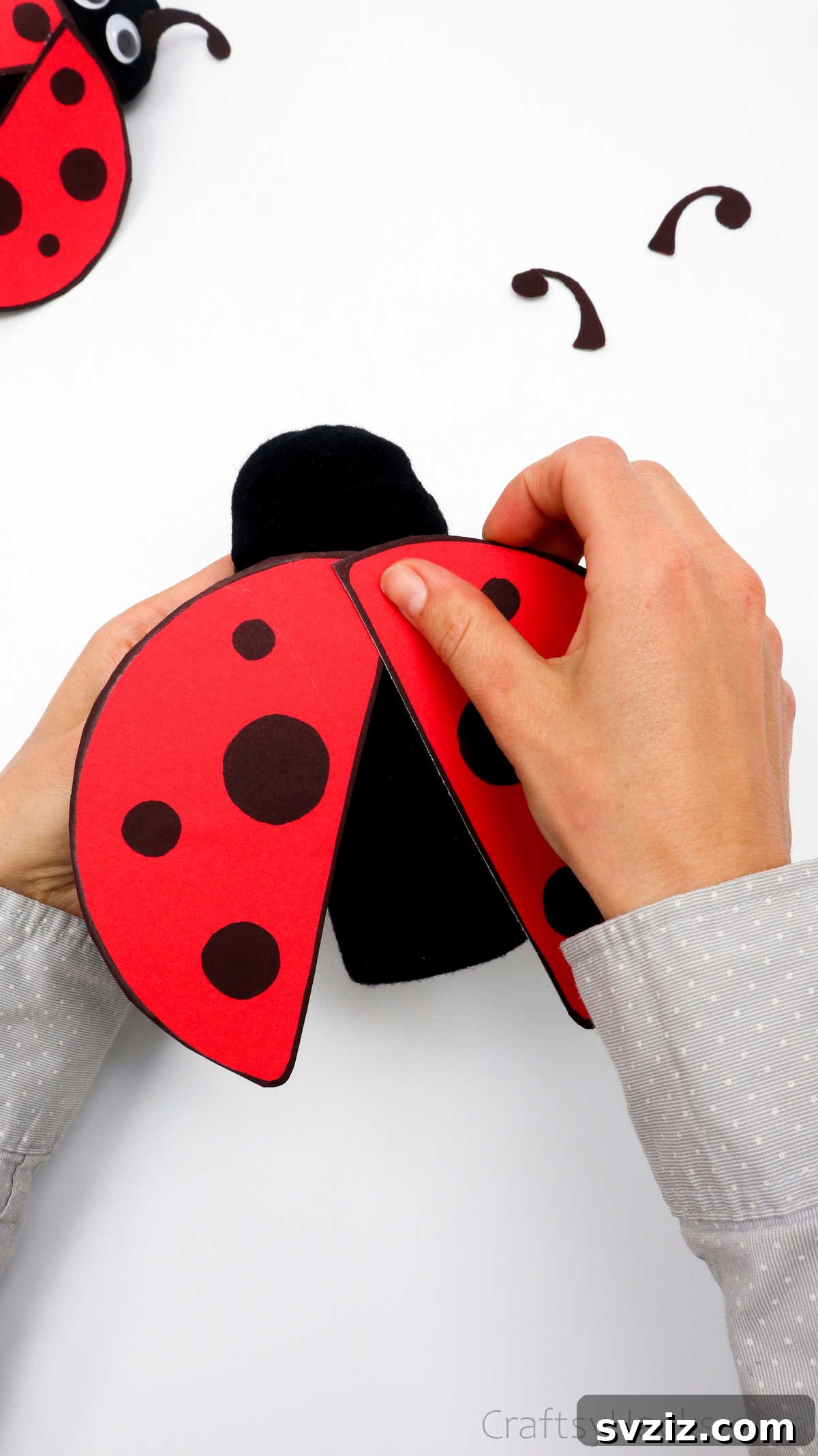 DIY Cardboard Tube Ladybugs 26 attaching ladybug wings