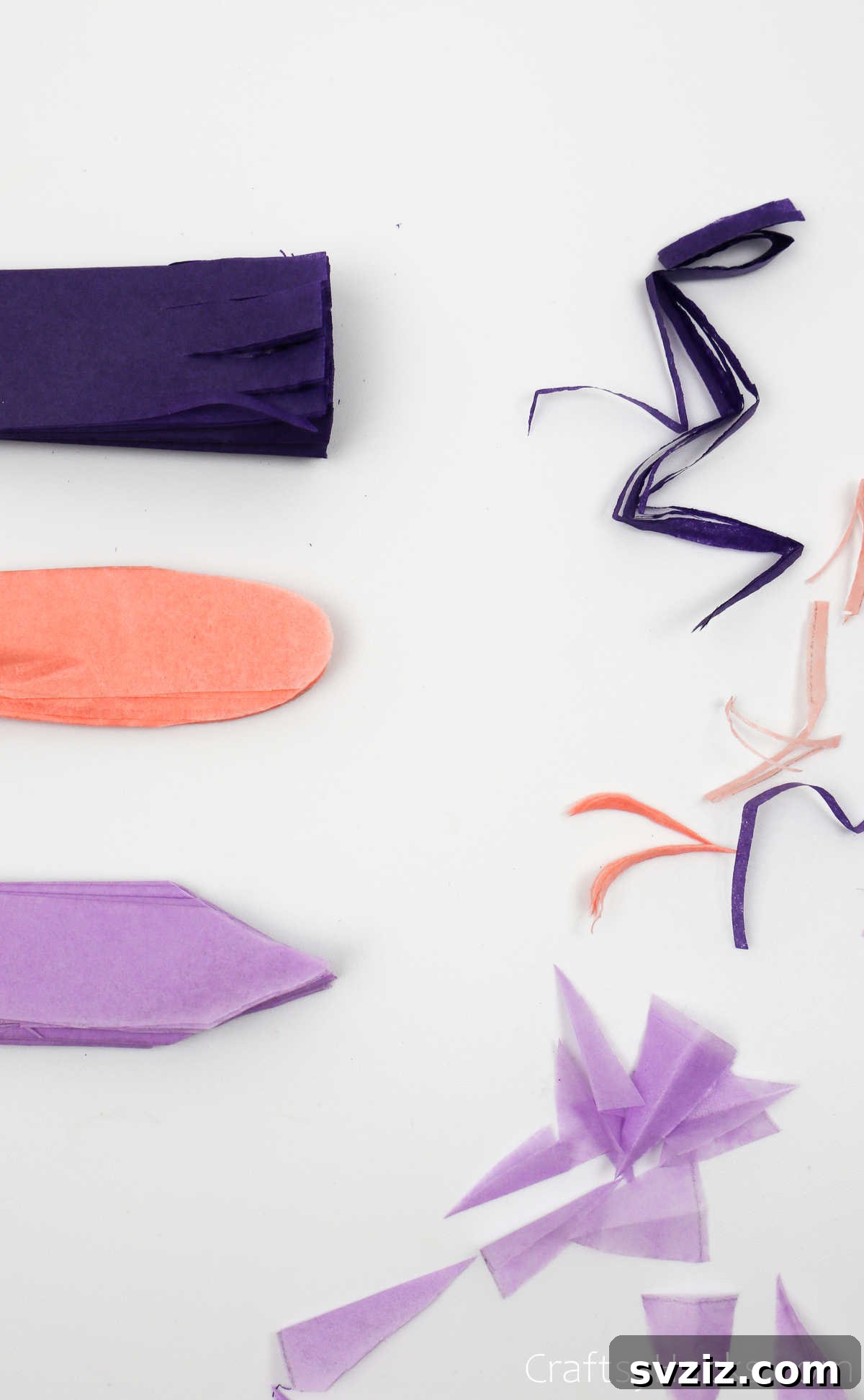 Examples of different cut edges on tissue paper bundles: V-shape, rounded, and fringed, demonstrating petal shape variations