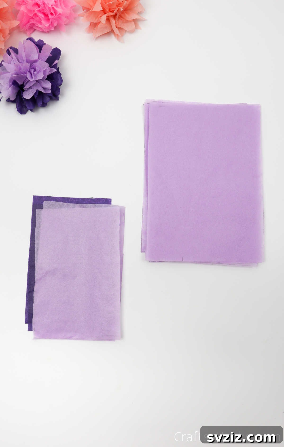 Stacked sheets of purple tissue paper, perfectly aligned and ready for folding, showcasing color selection