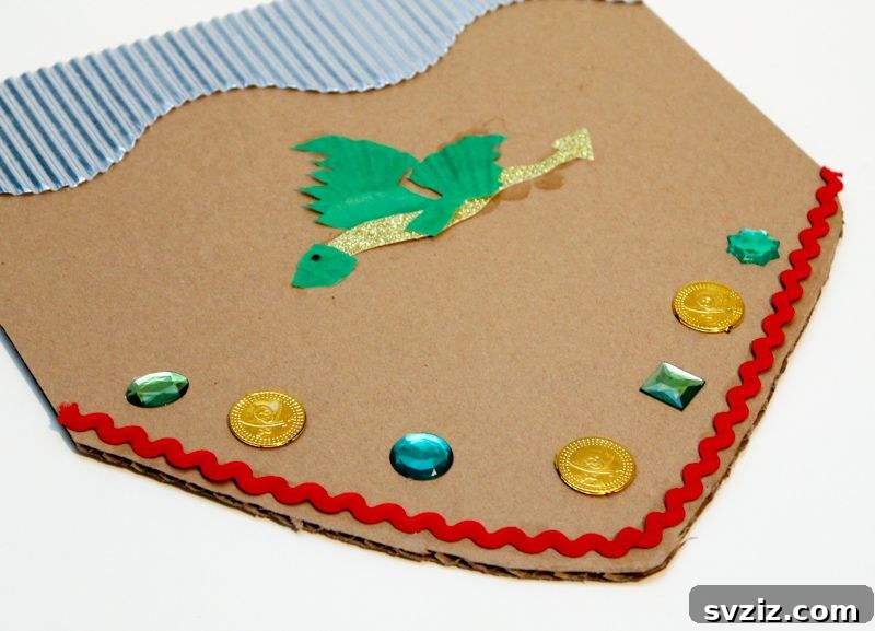 40+ Fun Cardboard Crafts for the Whole Family 16 DIY Cardboard Dragon Shield Craft