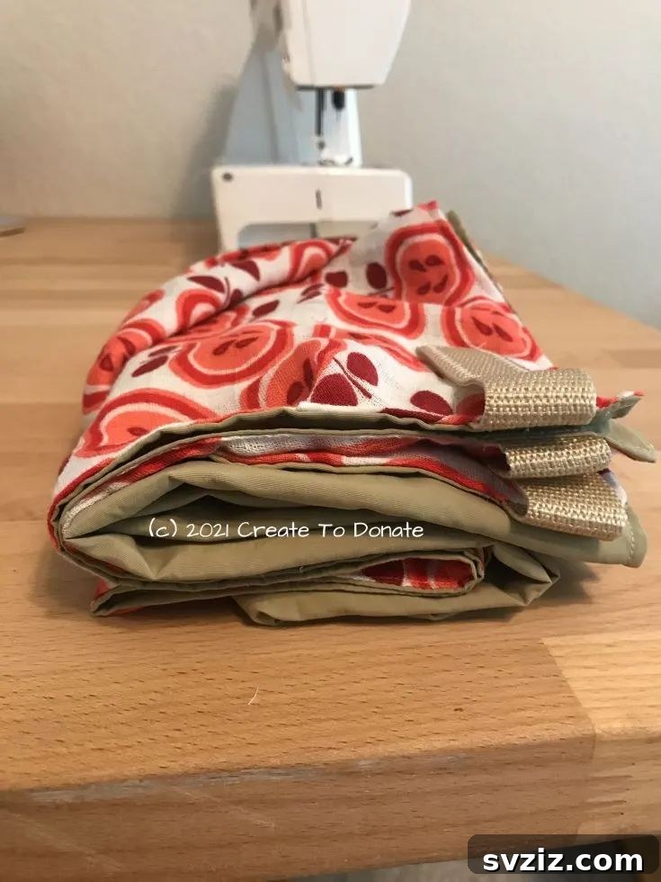 Effortless Stitching: 47 Projects for Every Skill Level 17 A lightweight, breathable sun protection blanket draped over a stroller, providing shade for a baby.