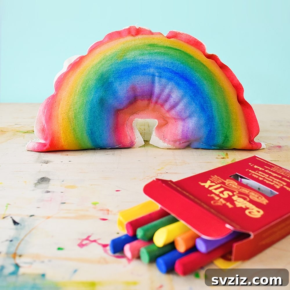 Effortless Stitching: 47 Projects for Every Skill Level 31 A collection of soft, rainbow-colored fabric shapes, showcasing DIY chalk pastel watercolor art on fabric.
