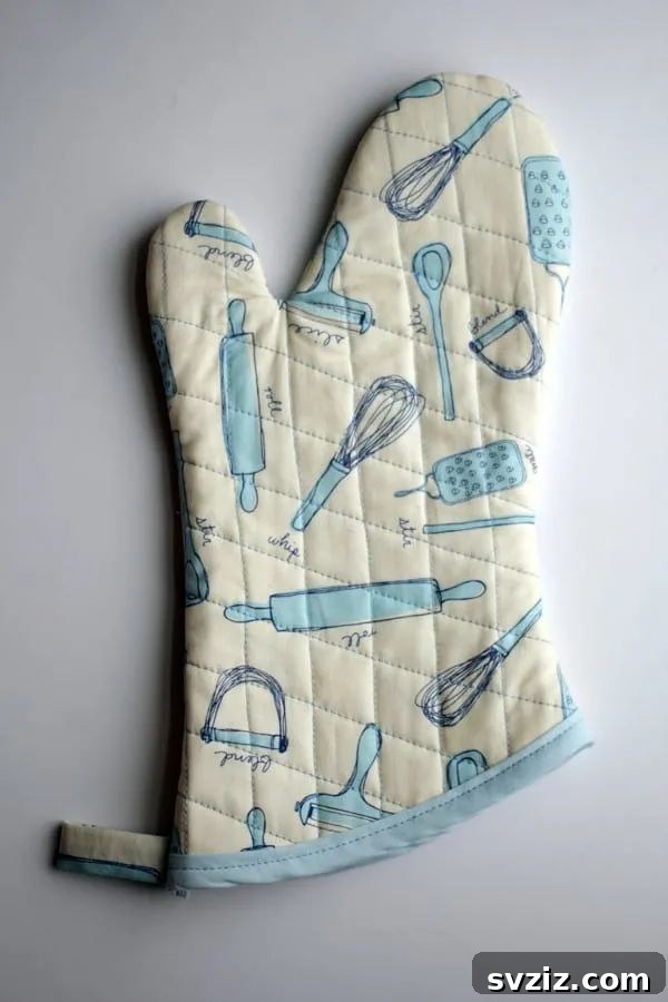 Effortless Stitching: 47 Projects for Every Skill Level 34 A colorful quilted pot holder with a loop for hanging, demonstrating practical kitchen sewing.