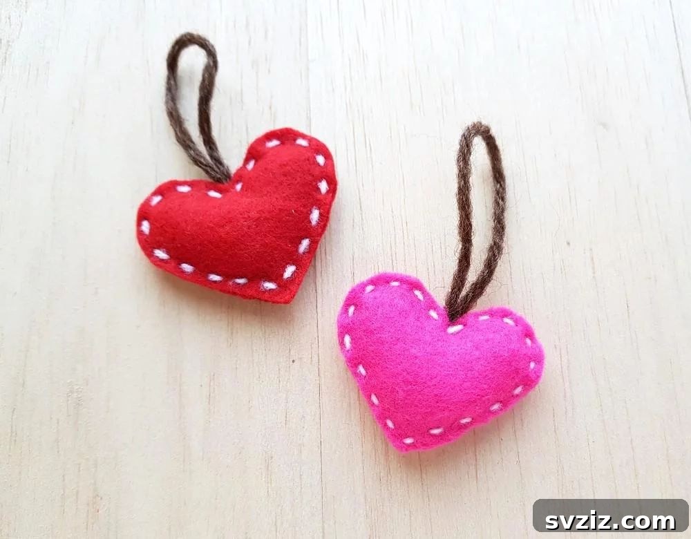 Effortless Stitching: 47 Projects for Every Skill Level 40 A soft, plush felt heart ornament decorated with embroidery, ideal for festive decor.