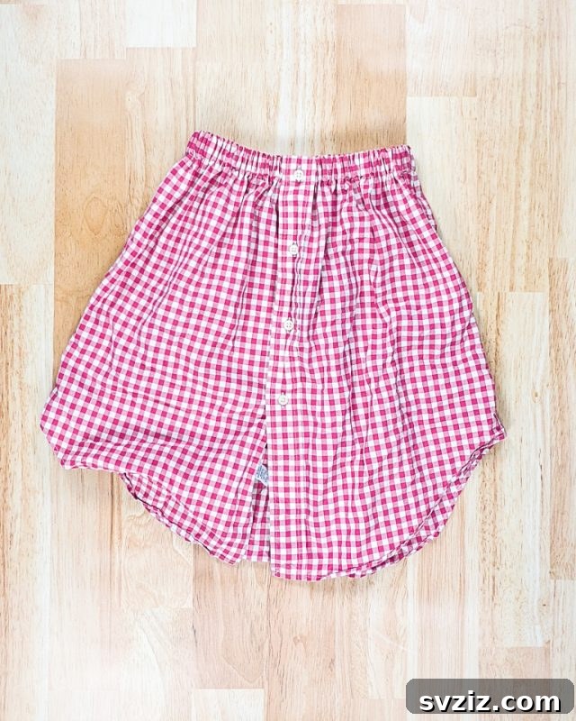 Effortless Stitching: 47 Projects for Every Skill Level 43 A stylish A-line skirt created from an upcycled men's plaid shirt, showcasing creative repurposing.