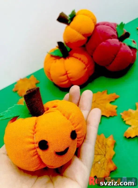 Effortless Stitching: 47 Projects for Every Skill Level 44 A trio of soft, fabric pumpkins in varying shades of orange, perfect for autumn decor.