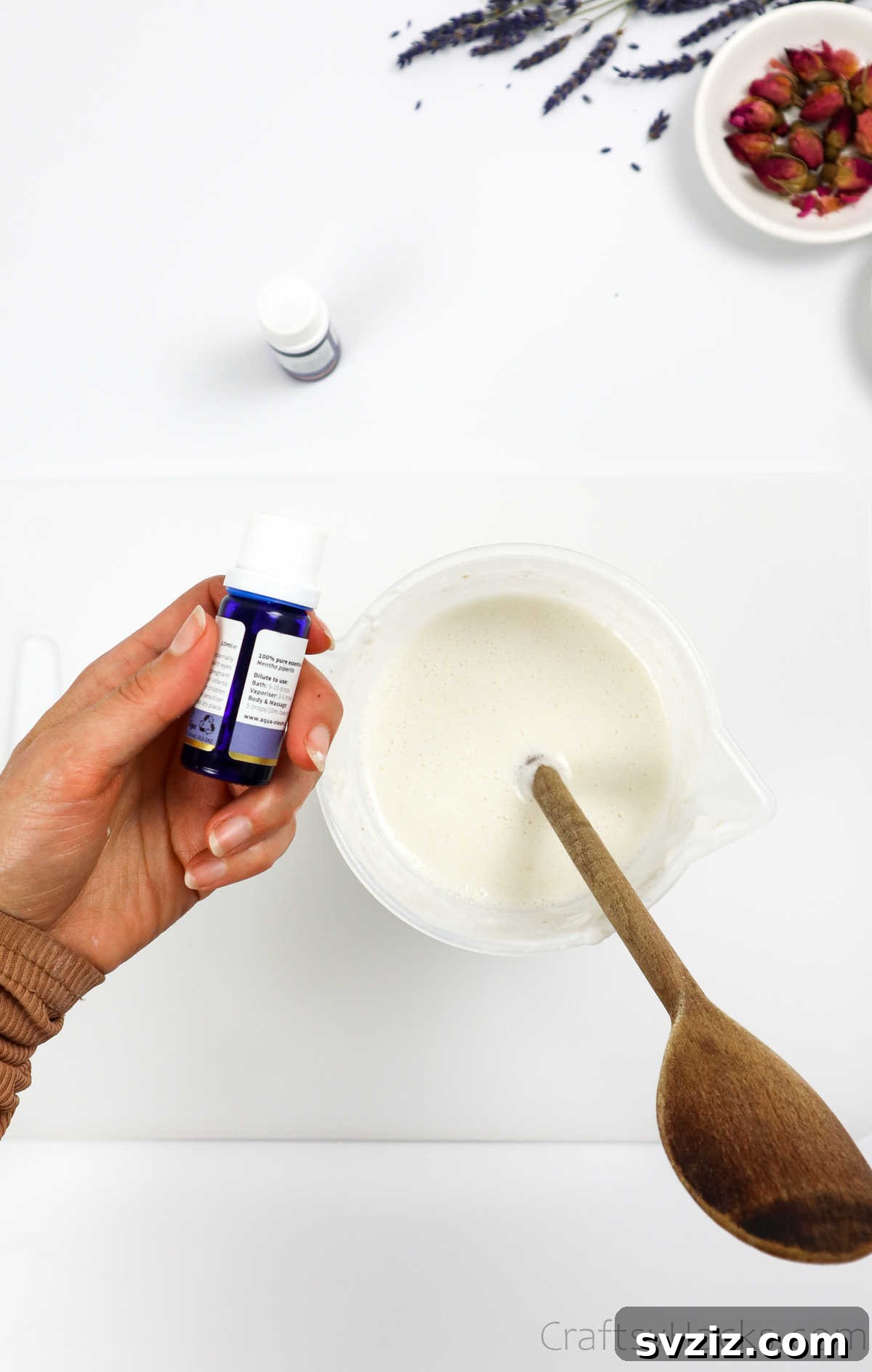 Your Guide to Crafting Homemade Soap 12 Adding drops of essential oil to melted soap base