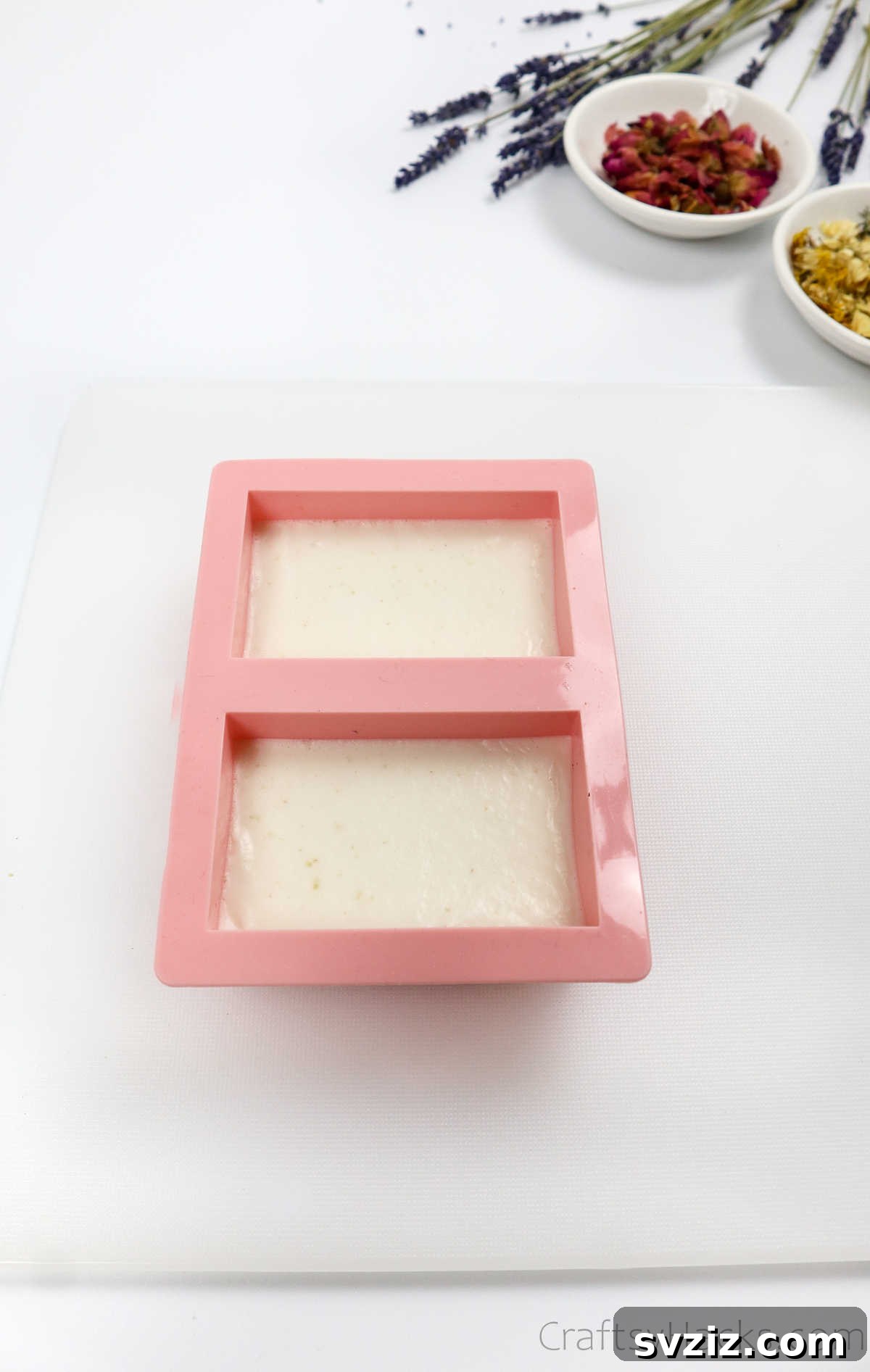 Your Guide to Crafting Homemade Soap 14 Freshly poured soap in silicone molds with bubbles removed by alcohol spray