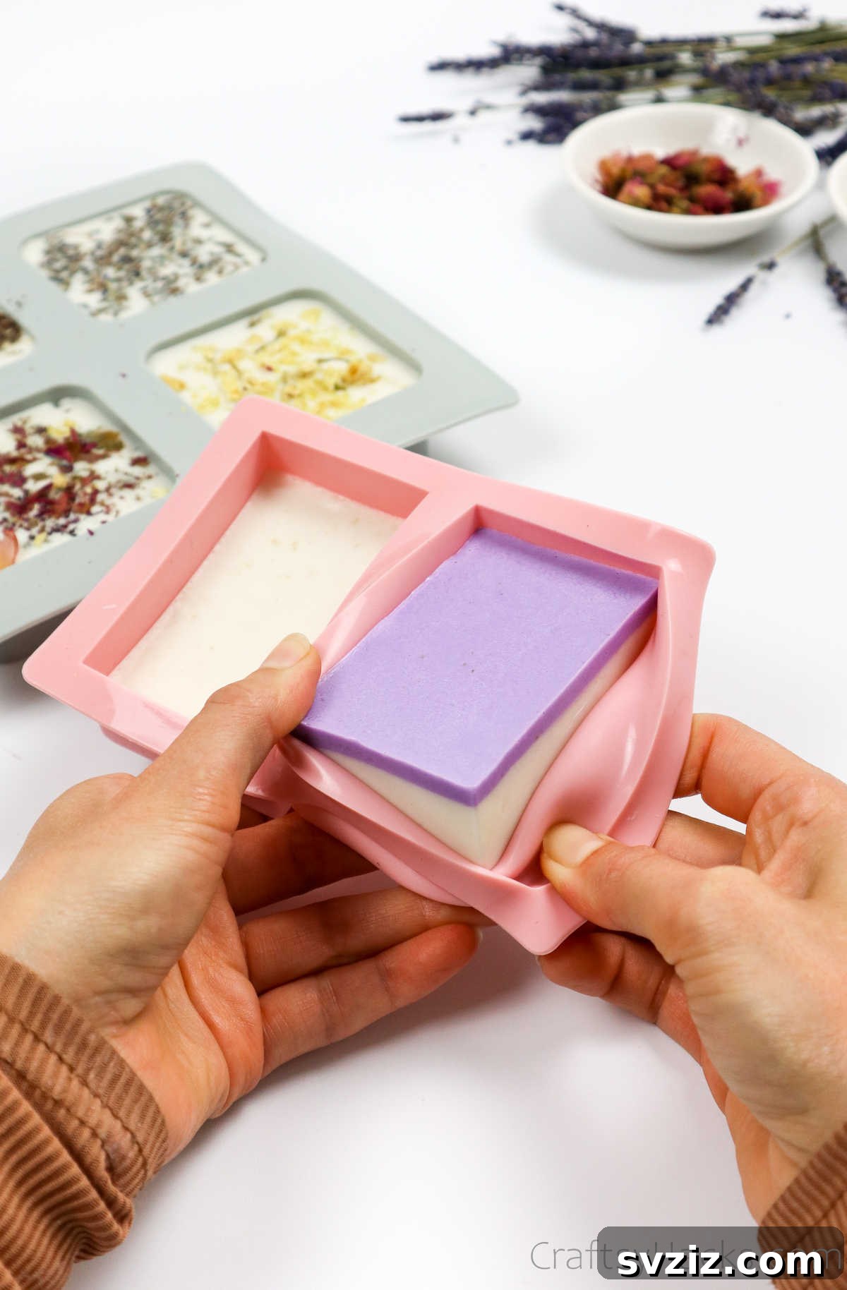 Your Guide to Crafting Homemade Soap 22 Another view of a soap bar being gently removed from a silicone mold