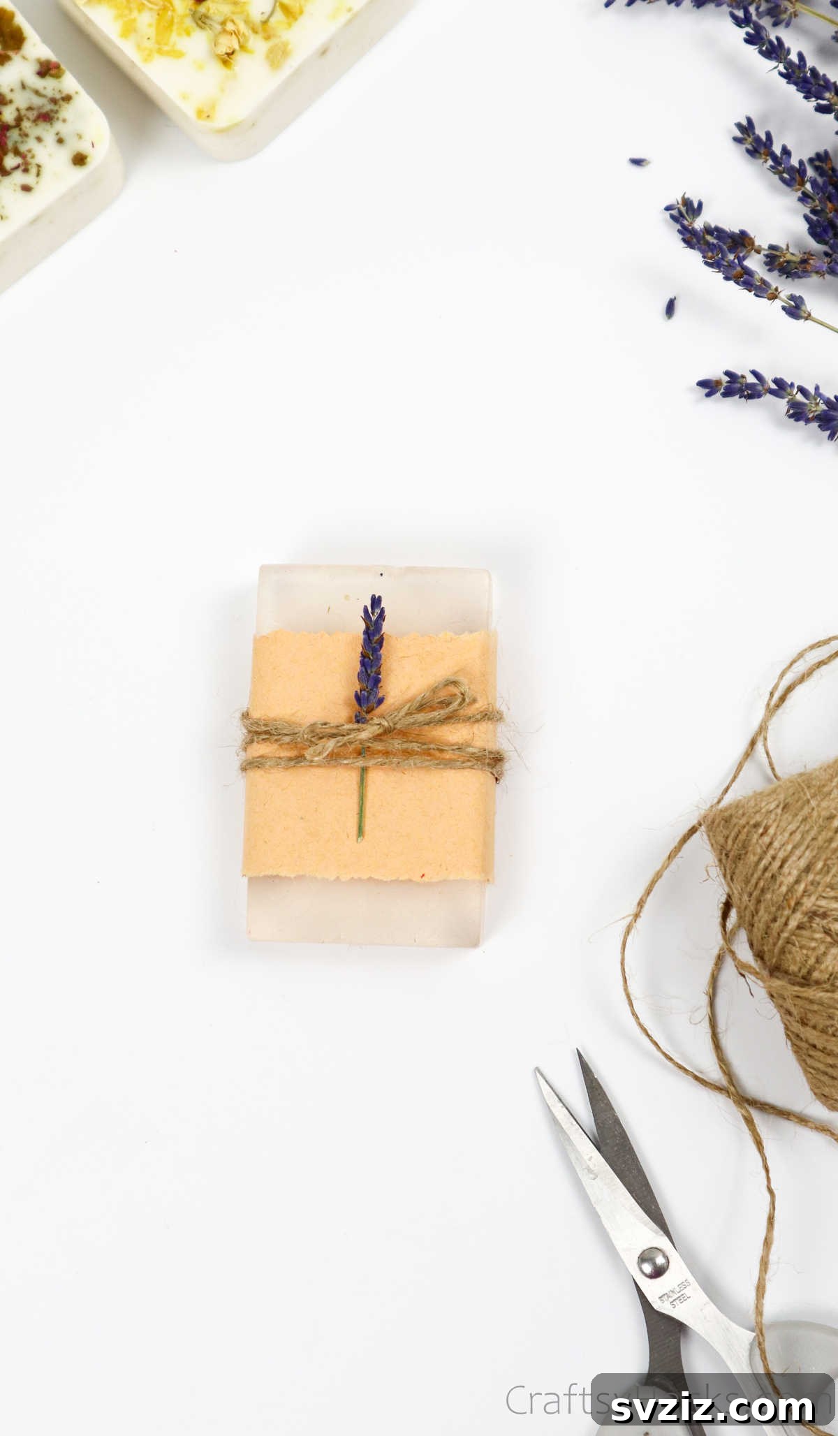 Your Guide to Crafting Homemade Soap 29 Beautifully wrapped soap bar with a dried flower accent