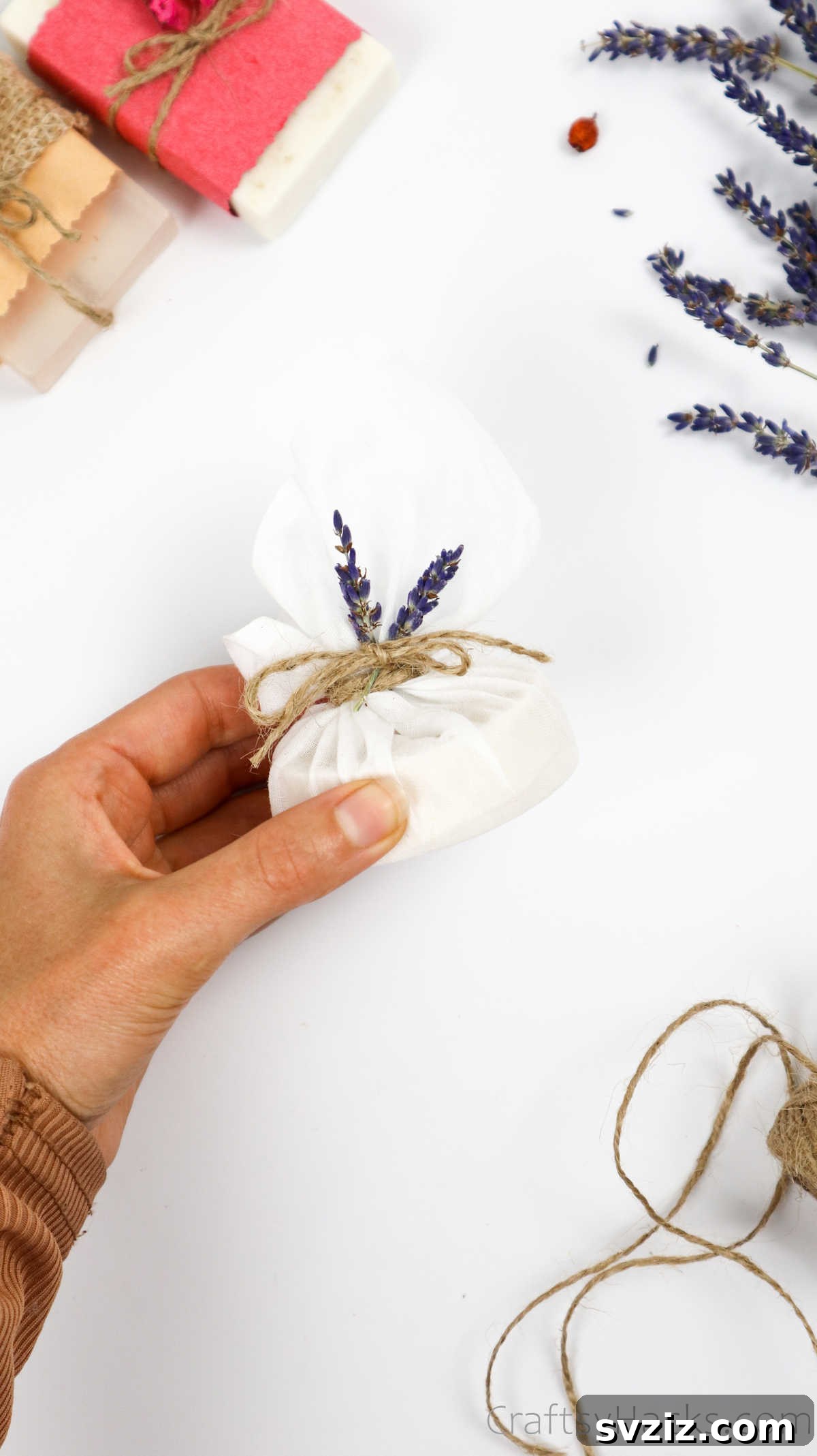 Your Guide to Crafting Homemade Soap 35 Finished cheesecloth-wrapped soap tied with natural string