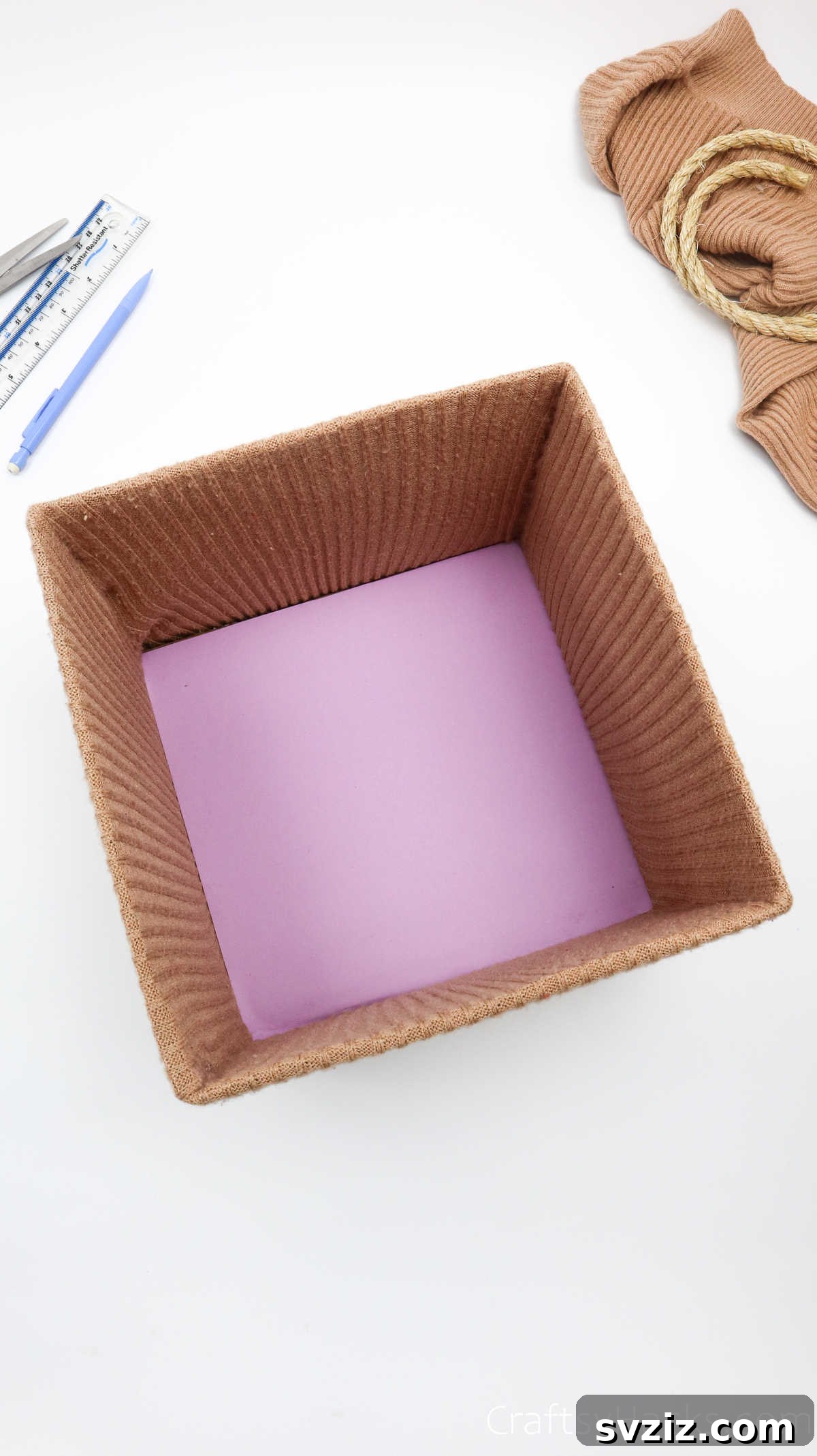 Cardboard bottom settled inside the storage box