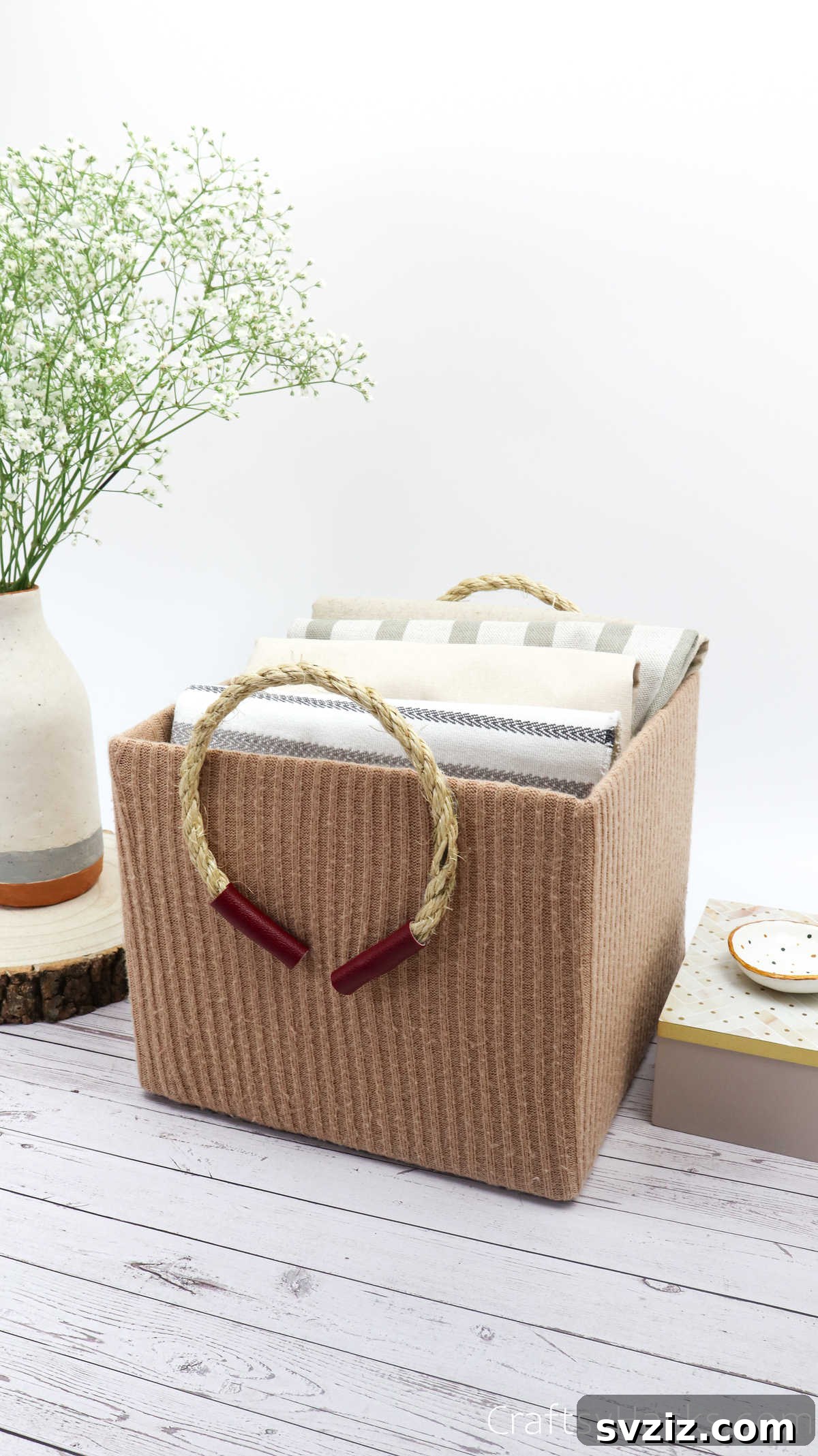 Multiple upcycled storage boxes with blankets