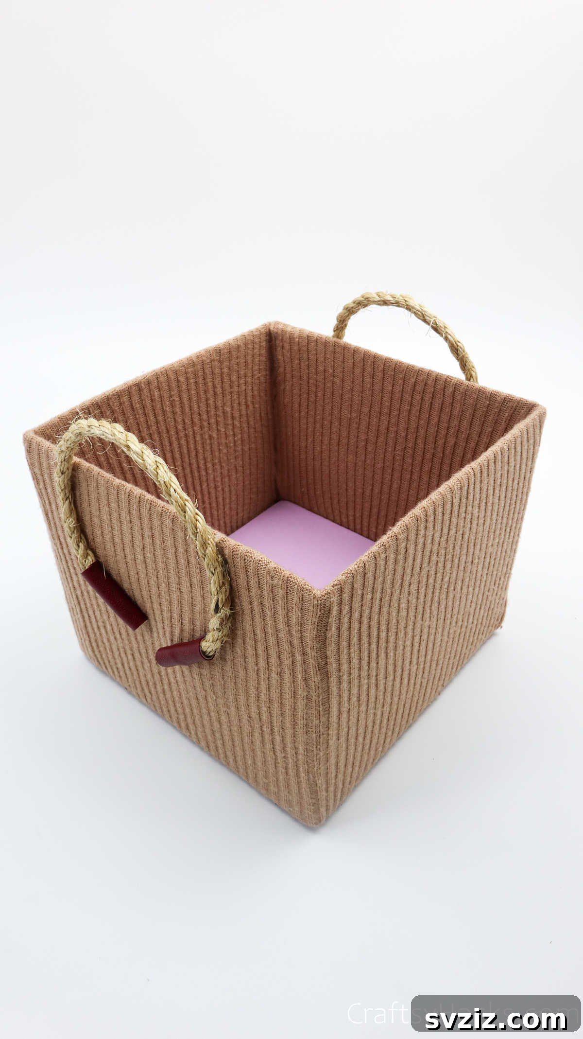 Fully completed DIY storage box with sweater cover and rope handles