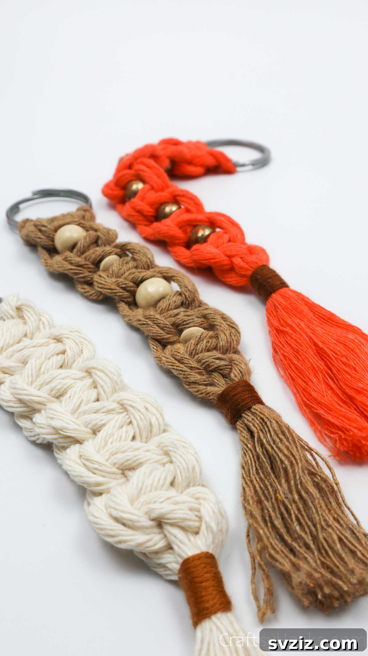 A collection of three vibrant macrame keychains, demonstrating different color combinations and bead placements.