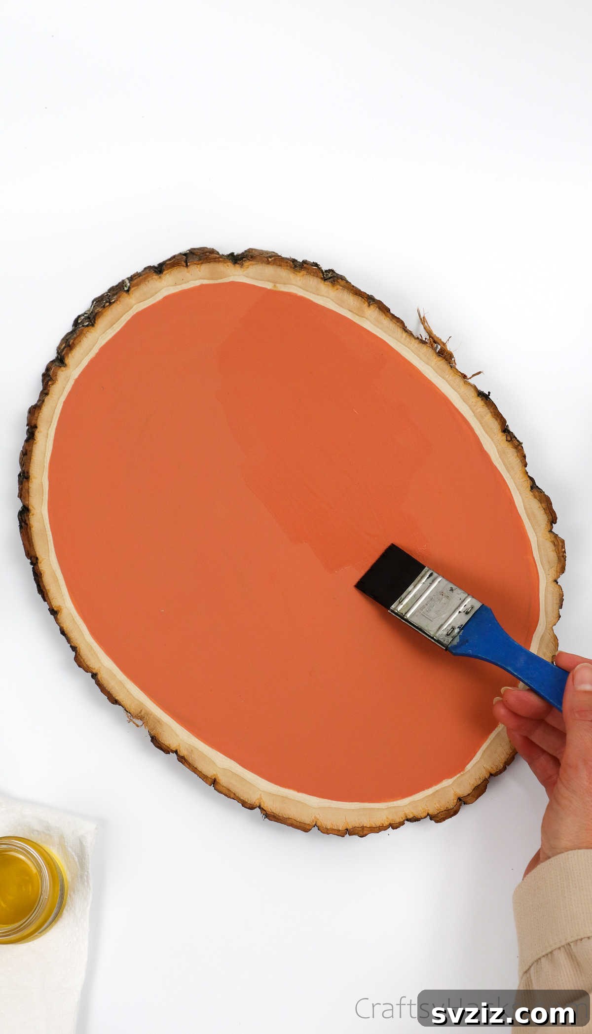 Eco-Chic Desk Organizer from Kitchen Recyclables 16 applying varnish to orange painted wood base