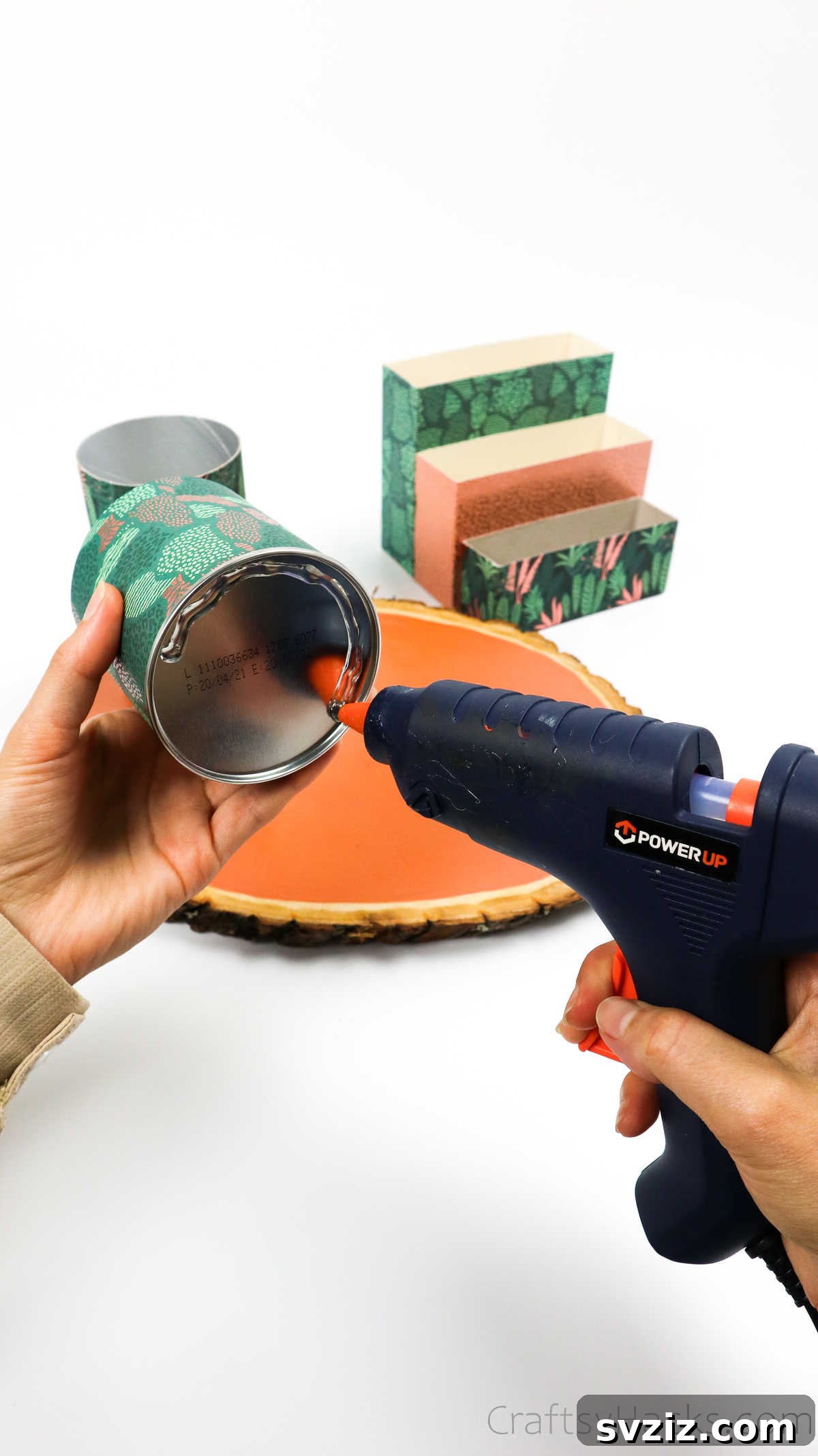 Eco-Chic Desk Organizer from Kitchen Recyclables 42 applying hot glue to base of cylindrical container