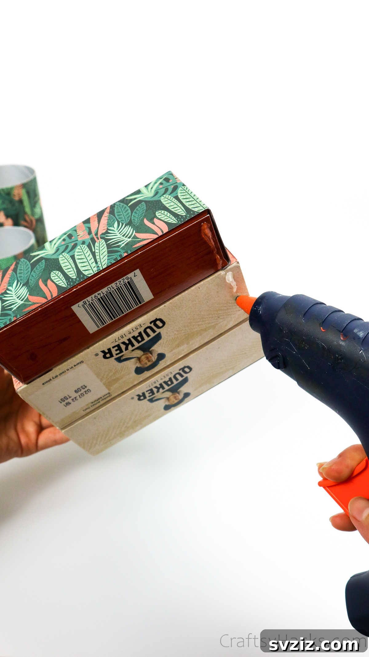 Eco-Chic Desk Organizer from Kitchen Recyclables 43 applying hot glue to bottom of assembled boxes