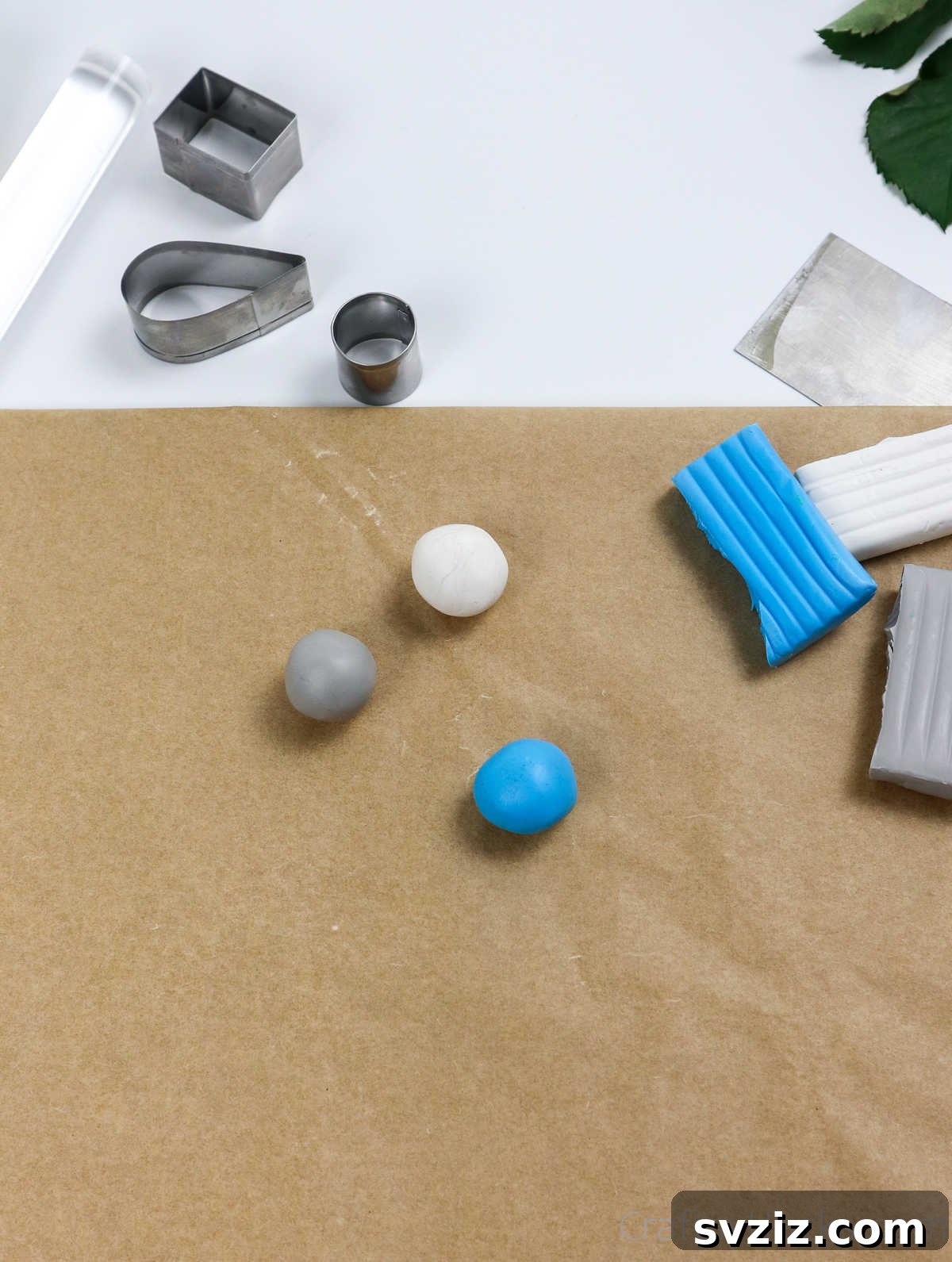 Craft Your Own Polymer Clay Earrings 11 Three conditioned balls of polymer clay in different colors