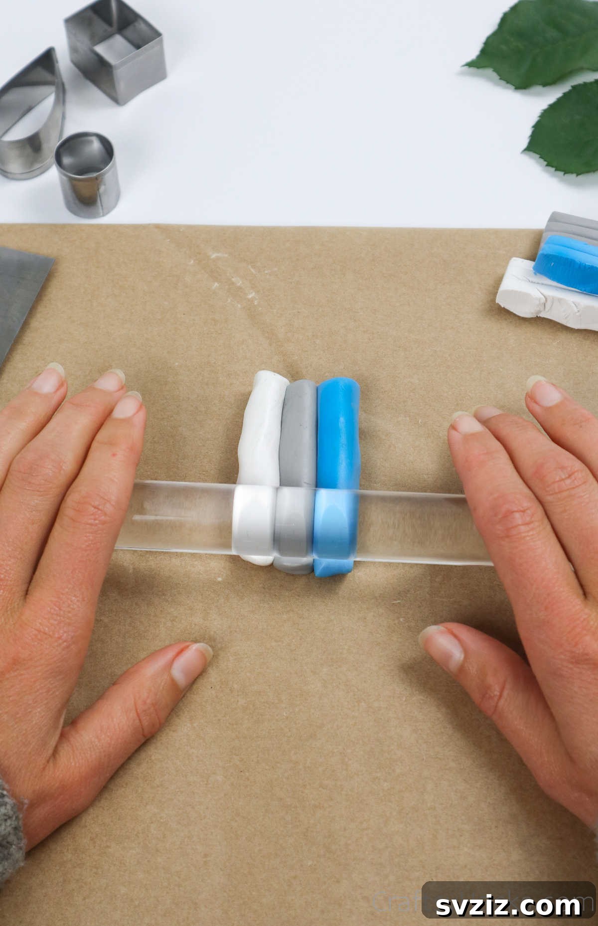 Craft Your Own Polymer Clay Earrings 14 Rolling out joined polymer clay strips to blend colors