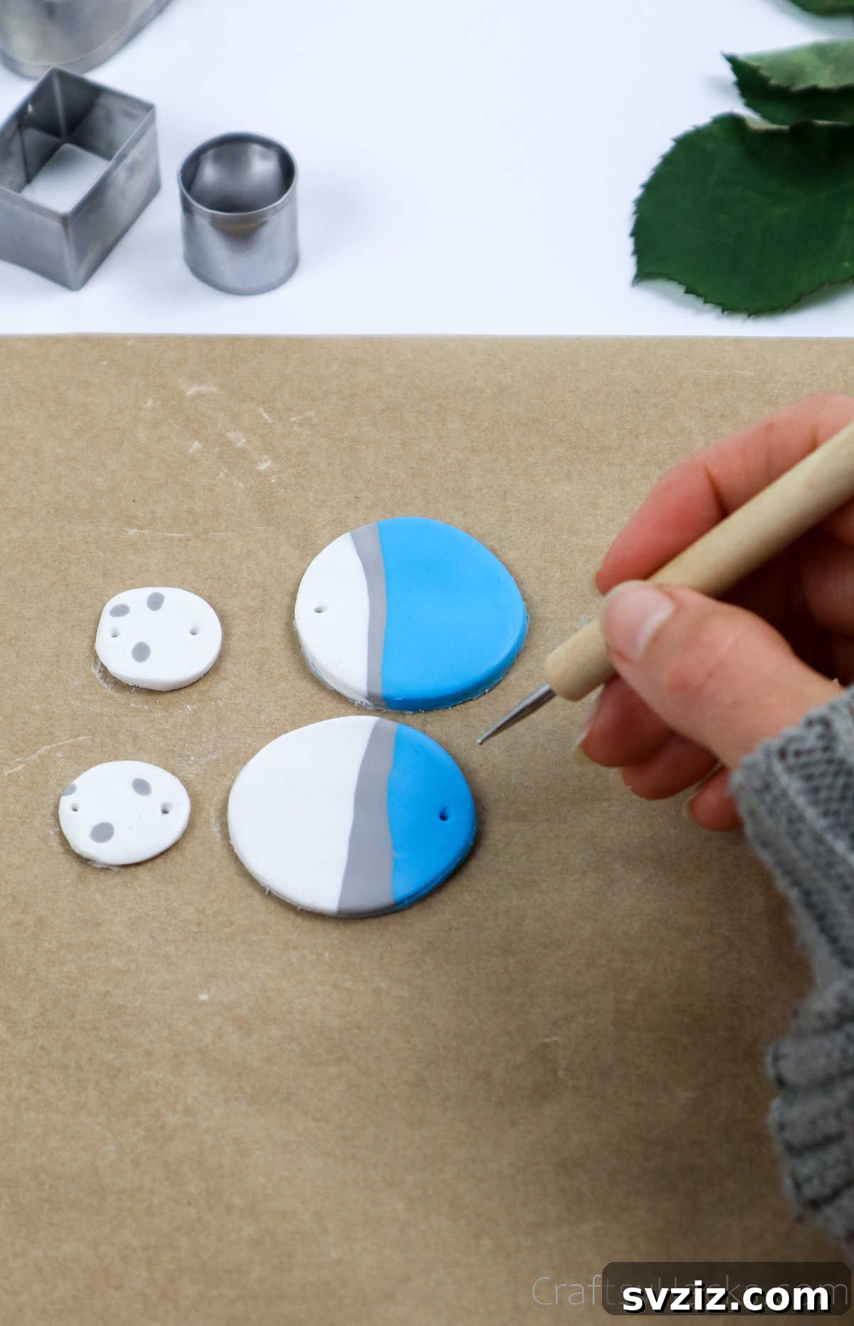 Craft Your Own Polymer Clay Earrings 26 Poking a hole into polymer clay for an earring hook