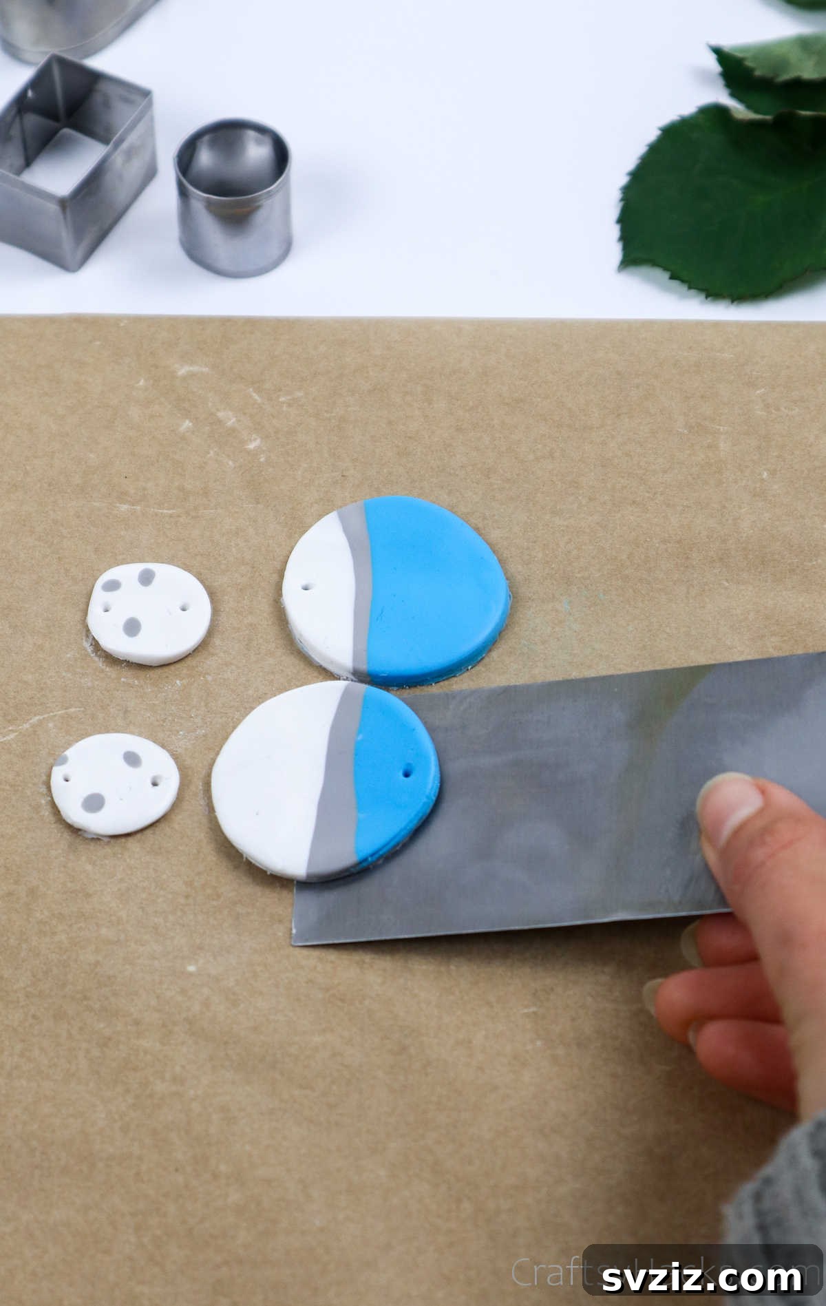 Craft Your Own Polymer Clay Earrings 27 Carefully removing a polymer clay earring from the work surface