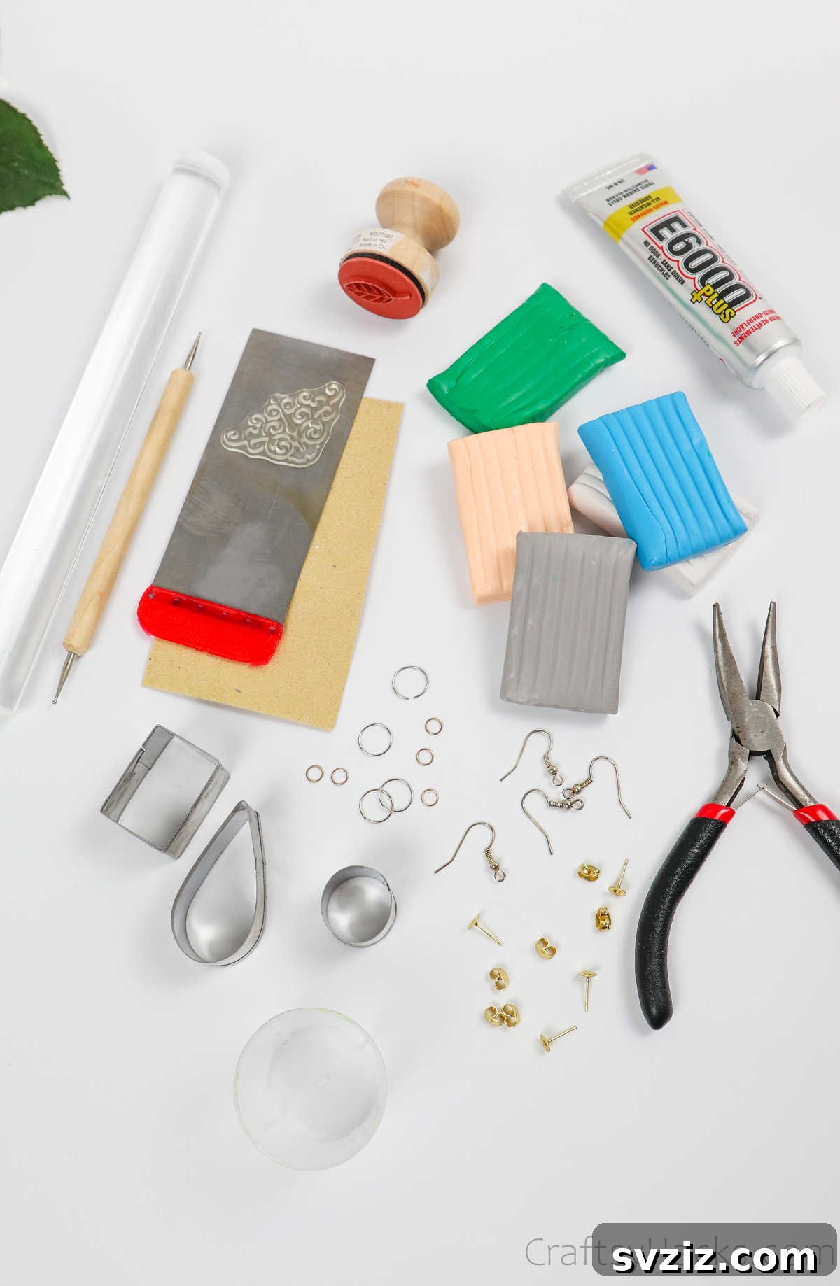 Craft Your Own Polymer Clay Earrings 5 Various crafting supplies laid out on a table