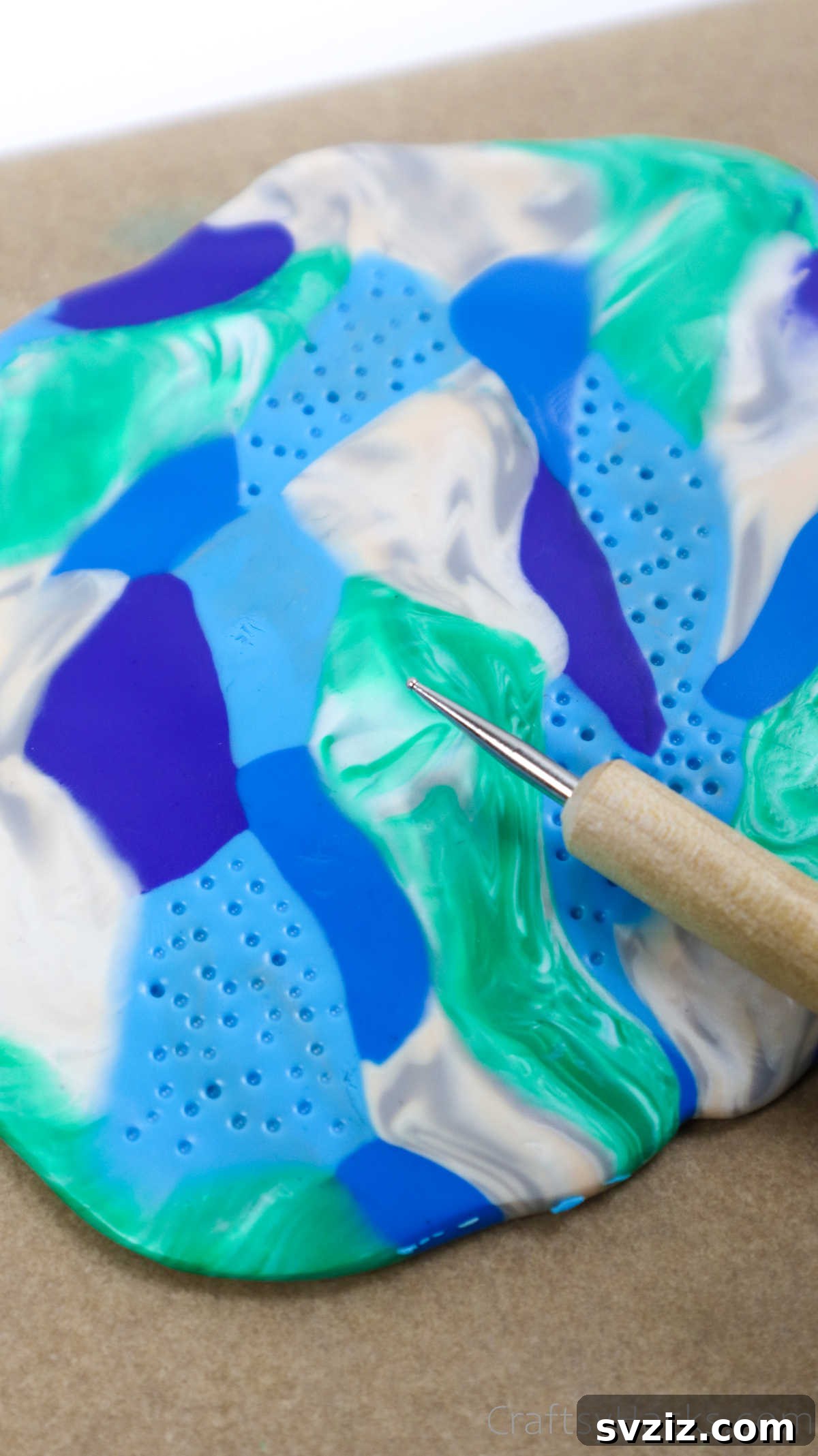 Craft Your Own Polymer Clay Earrings 44 Poking small holes into layered polymer clay for texture