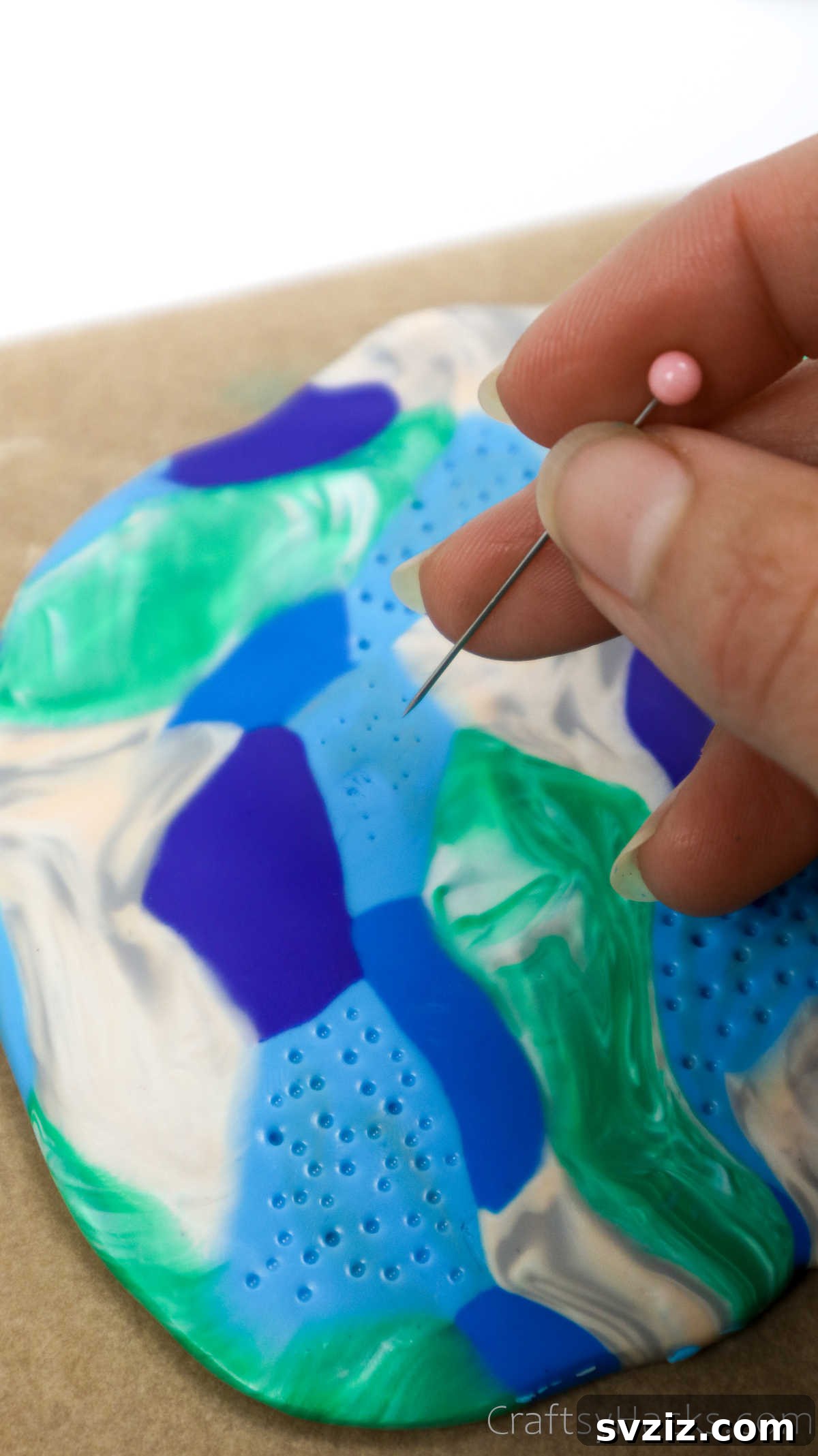 Craft Your Own Polymer Clay Earrings 45 Using a pin to add texture to polymer clay