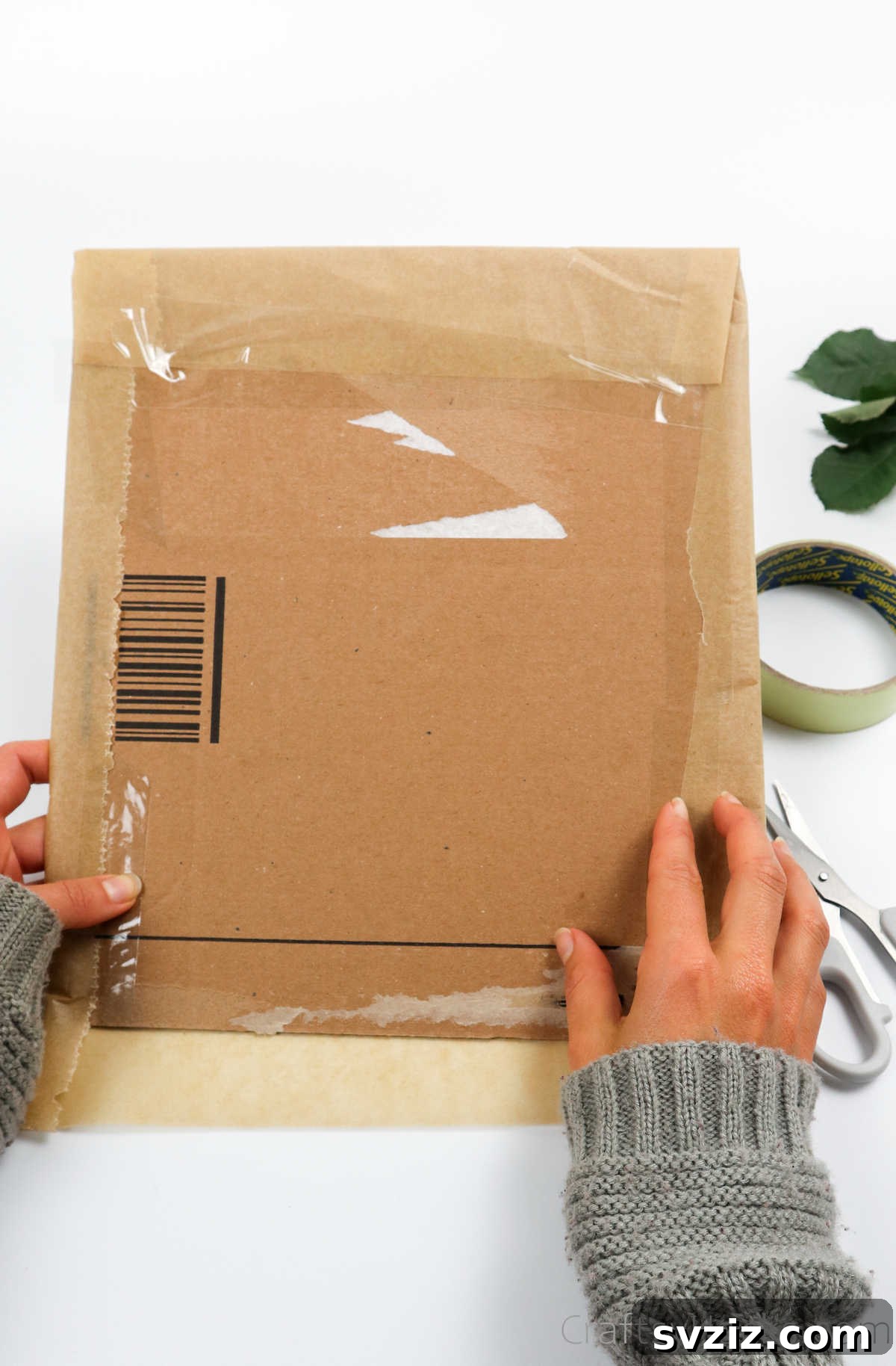 Craft Your Own Polymer Clay Earrings 7 Taping parchment paper onto a cardboard surface