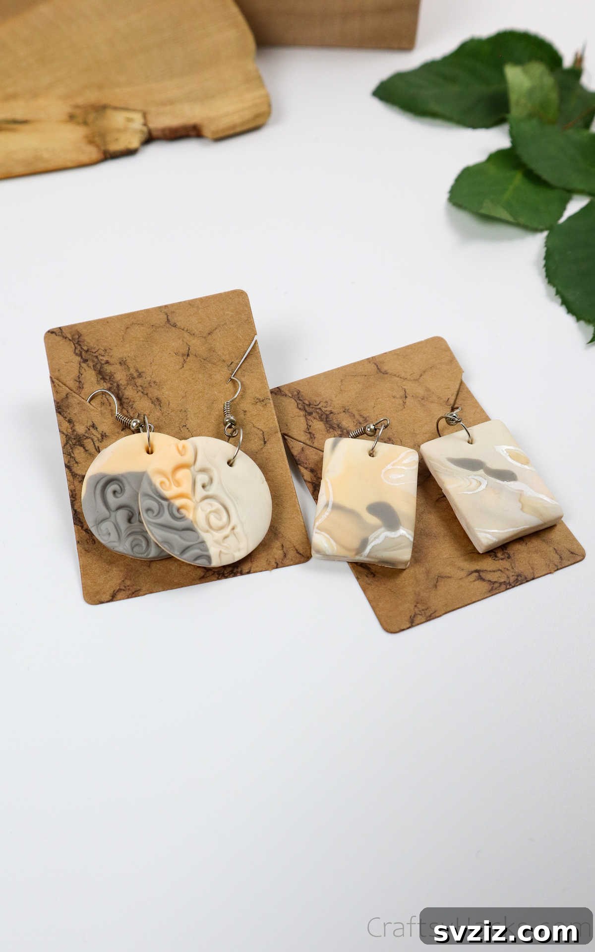 Craft Your Own Polymer Clay Earrings 62 Finished polymer clay earrings displayed on a paper backing
