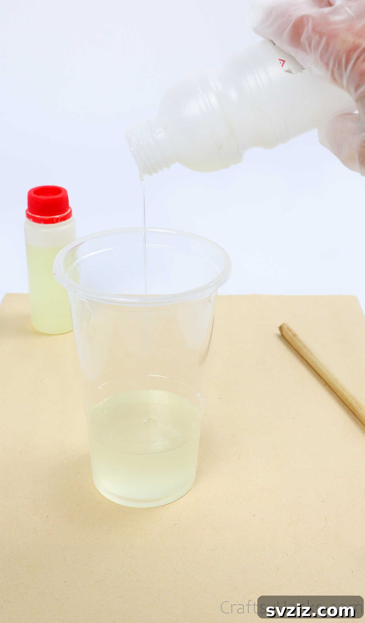 DIY Resin Coasters A Complete Guide 7 pouring resin in cup