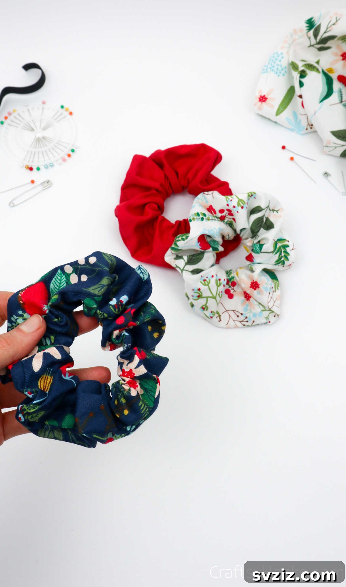 Craft Your Perfect Hair Scrunchie 29 Hand holding a finished blue scrunchie against a light background