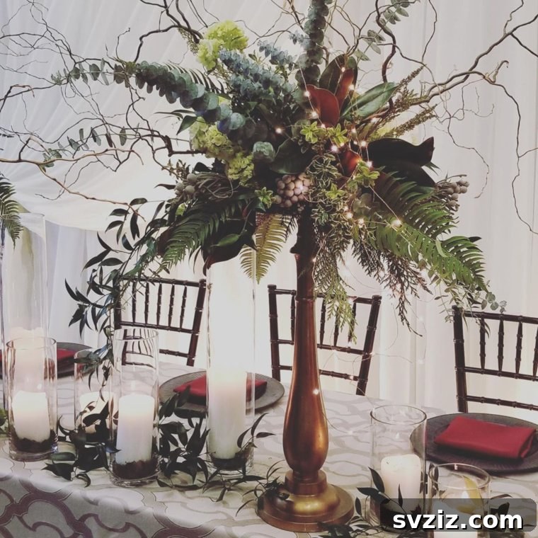 25 Gorgeous Wedding Centerpiece Inspirations 21 Verdant Greenery Display with Tall Candles