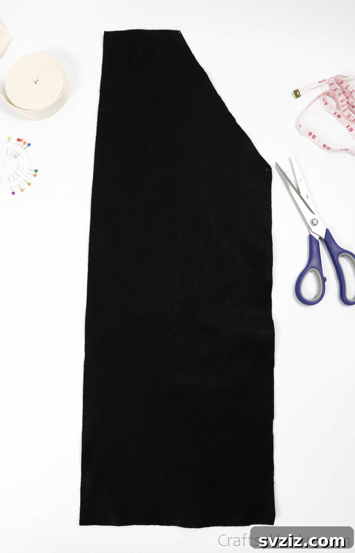 Craft Your Own Custom Apron 12 Carefully cutting out the apron shape from the template fabric with sharp scissors, ensuring precision for the main apron piece.