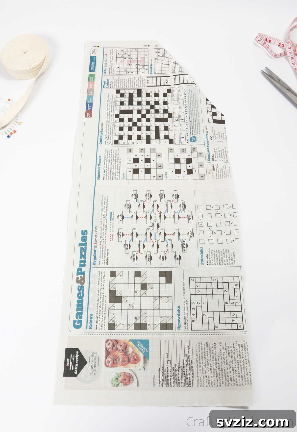 Craft Your Own Custom Apron 13 A newspaper template, a cost-effective and easy alternative for outlining your DIY apron pattern before cutting into the main fabric.