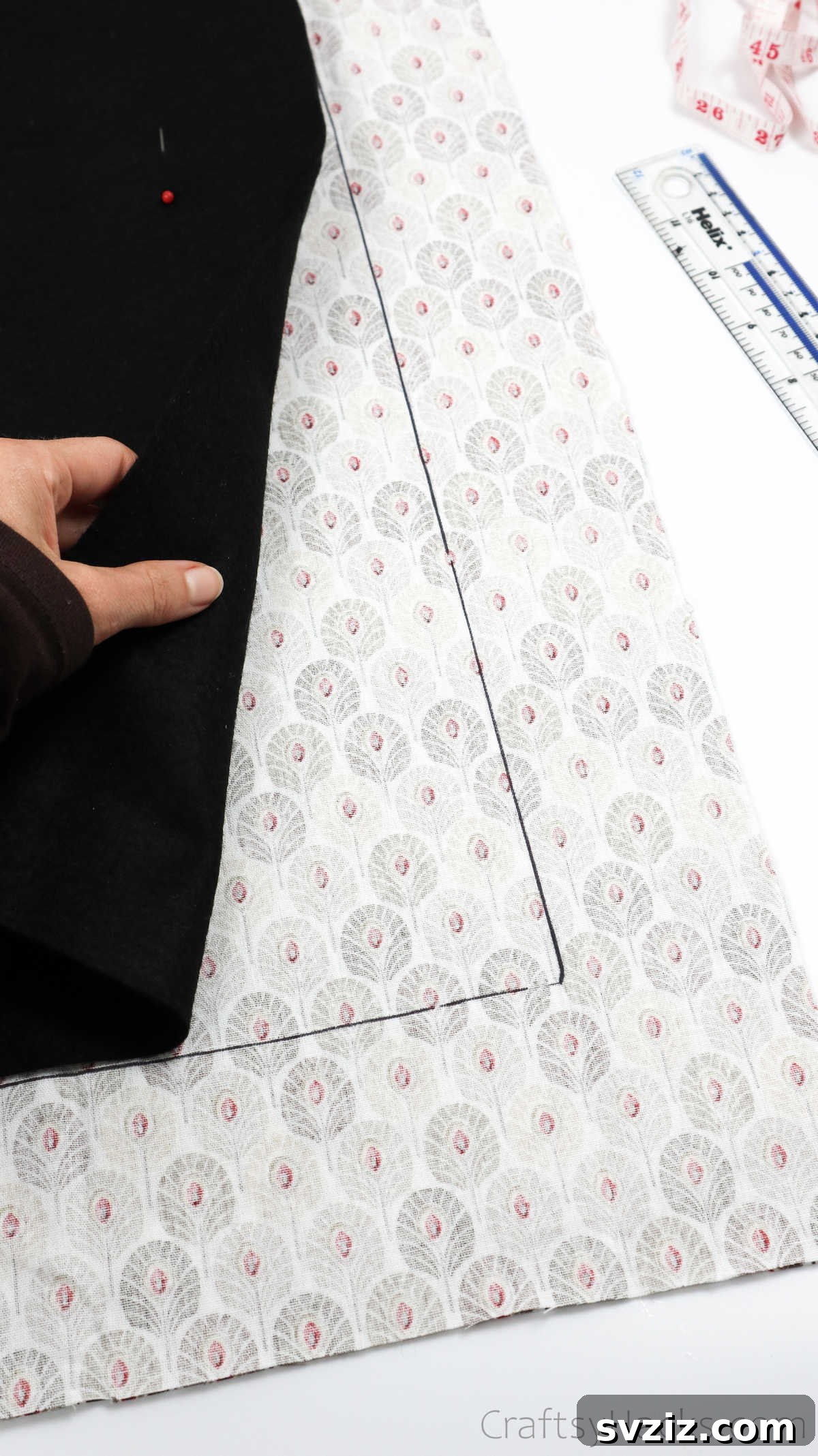 Craft Your Own Custom Apron 17 A distinct black line on the fabric marks the outline of the apron, ready for cutting and sewing.