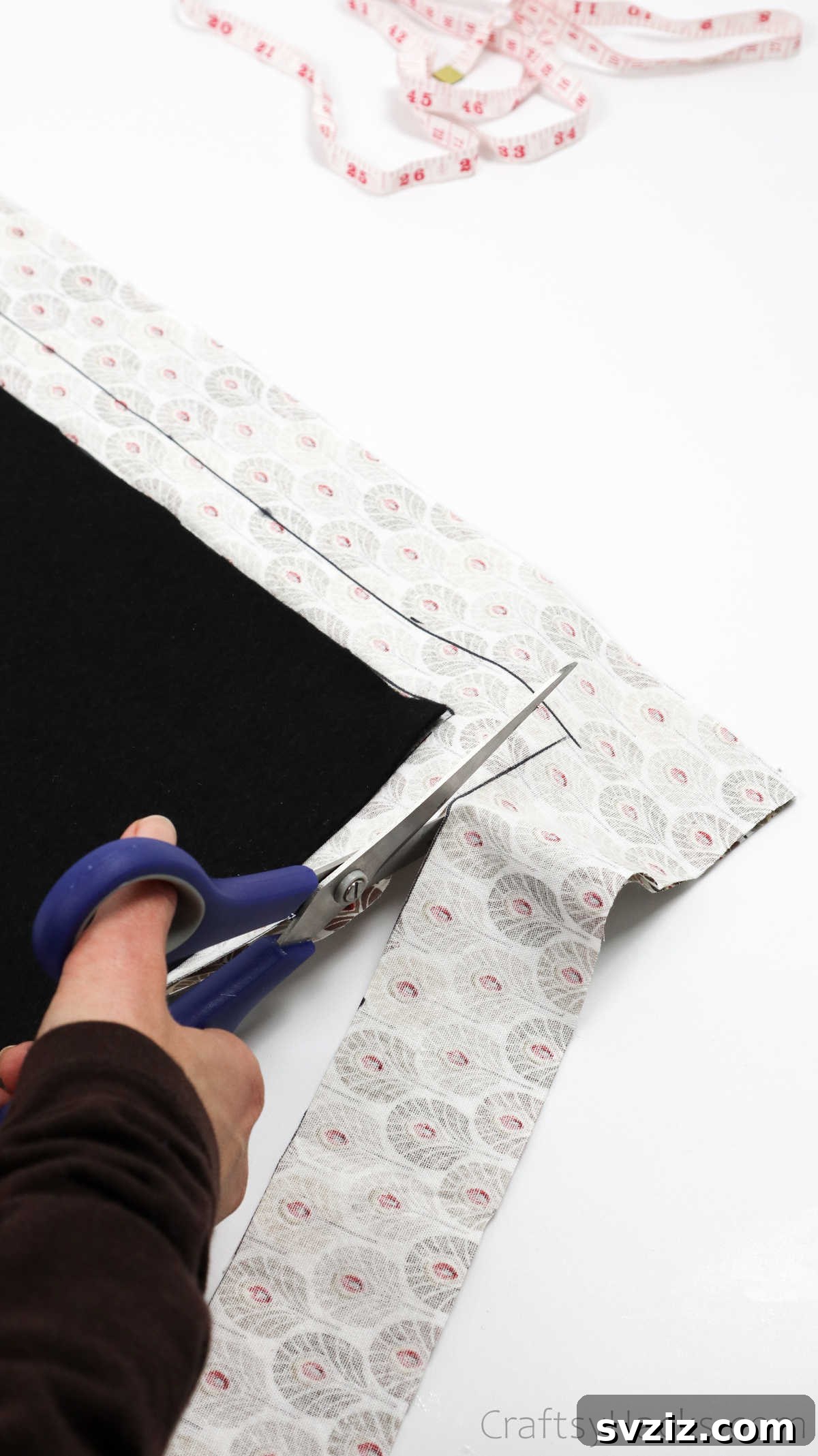 Craft Your Own Custom Apron 18 Carefully cutting the main apron fabric along the outer traced line, ensuring a precise 1-inch seam allowance for a professional finish.