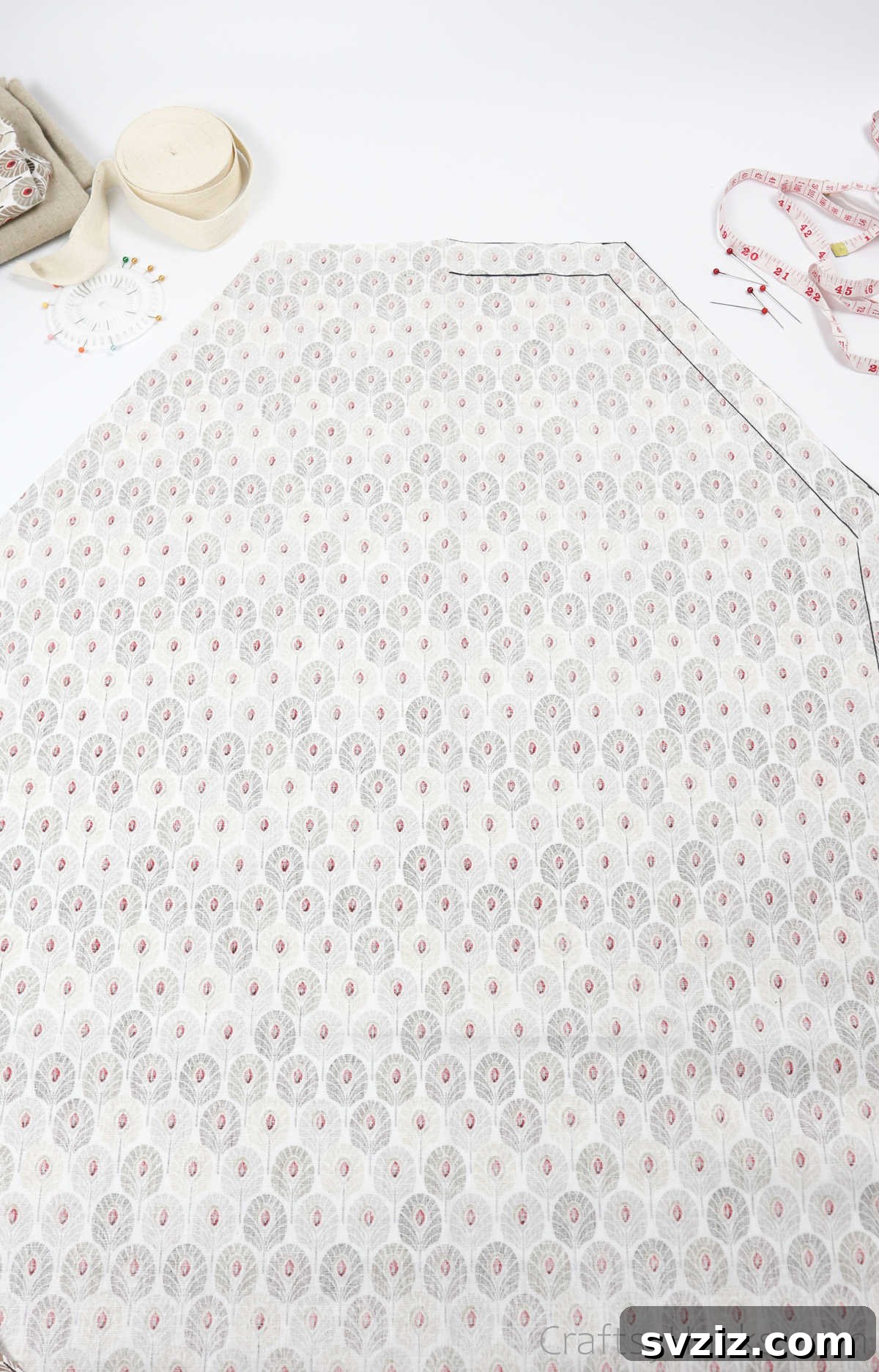 Craft Your Own Custom Apron 21 A large piece of fabric, laid out flat, displaying the initial markings for a DIY apron, ready for further steps.