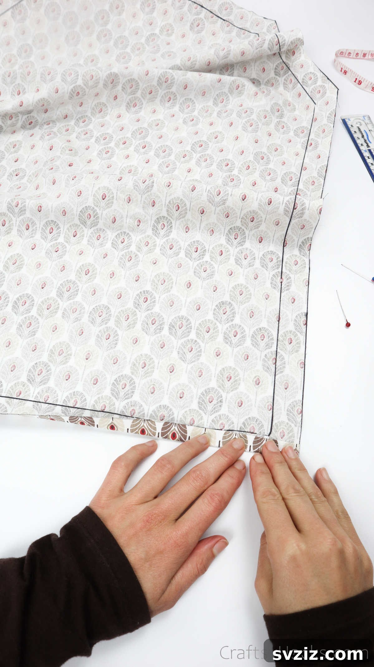Craft Your Own Custom Apron 24 Carefully folding the edges of the fabric inward, a crucial step for creating clean and durable hems for your DIY apron.