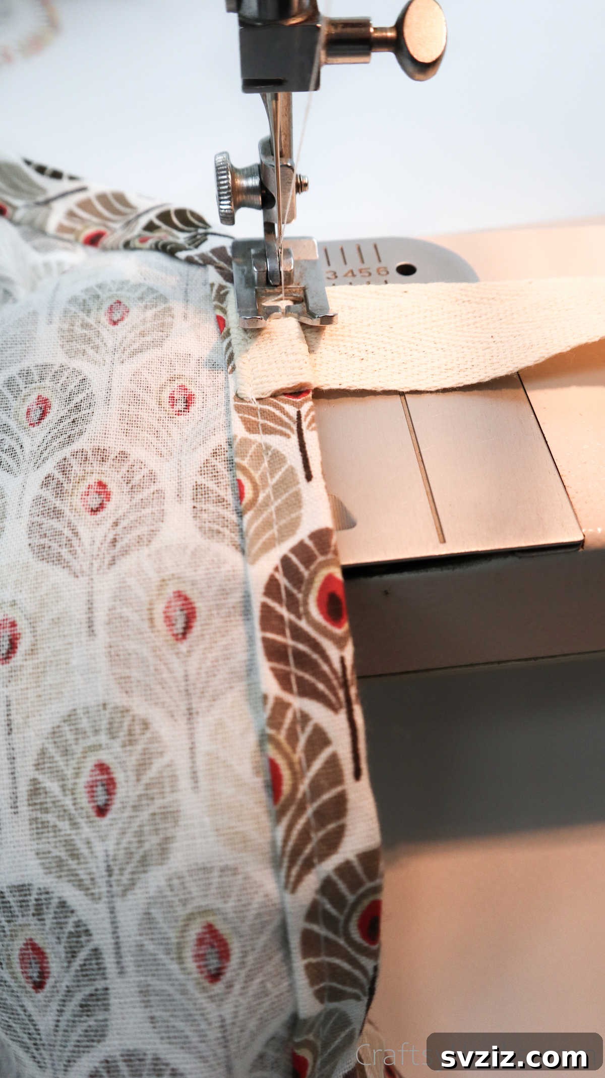 Craft Your Own Custom Apron 33 Skillfully sewing the straps onto the apron with a sewing machine, creating a durable and long-lasting attachment.
