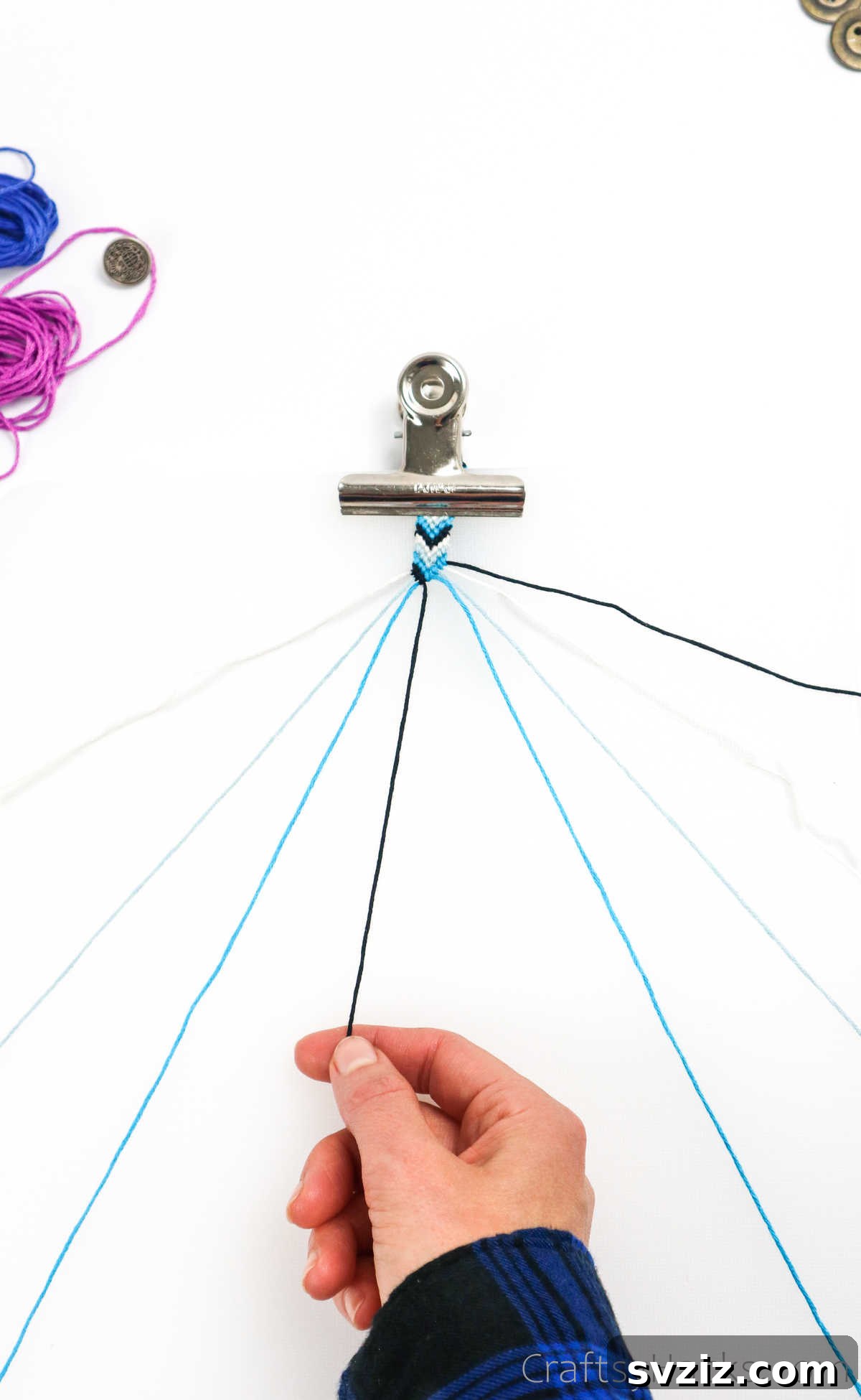 Crafting Friendship Bracelets 54 holding thread