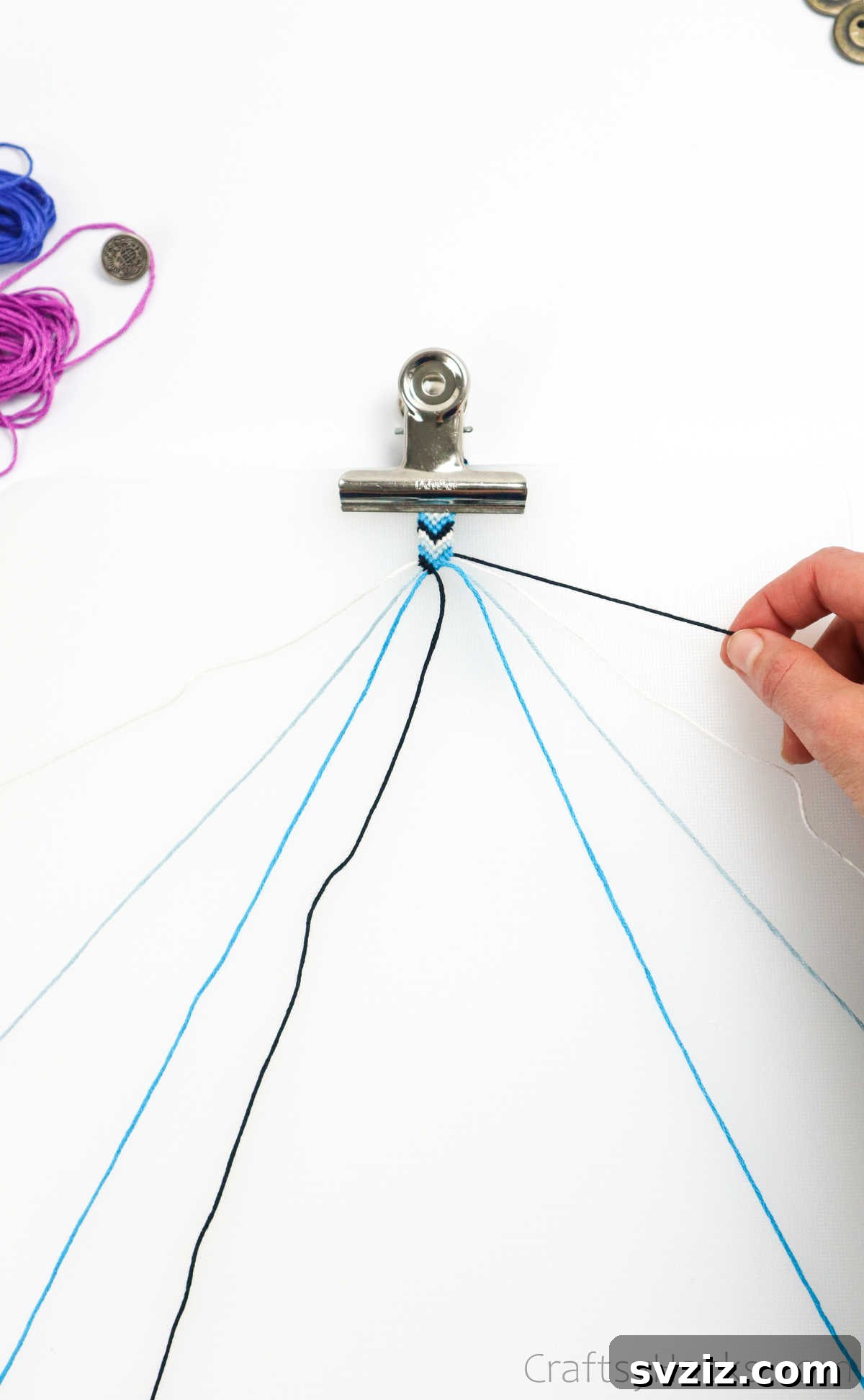 Crafting Friendship Bracelets 55 holding other side of thread